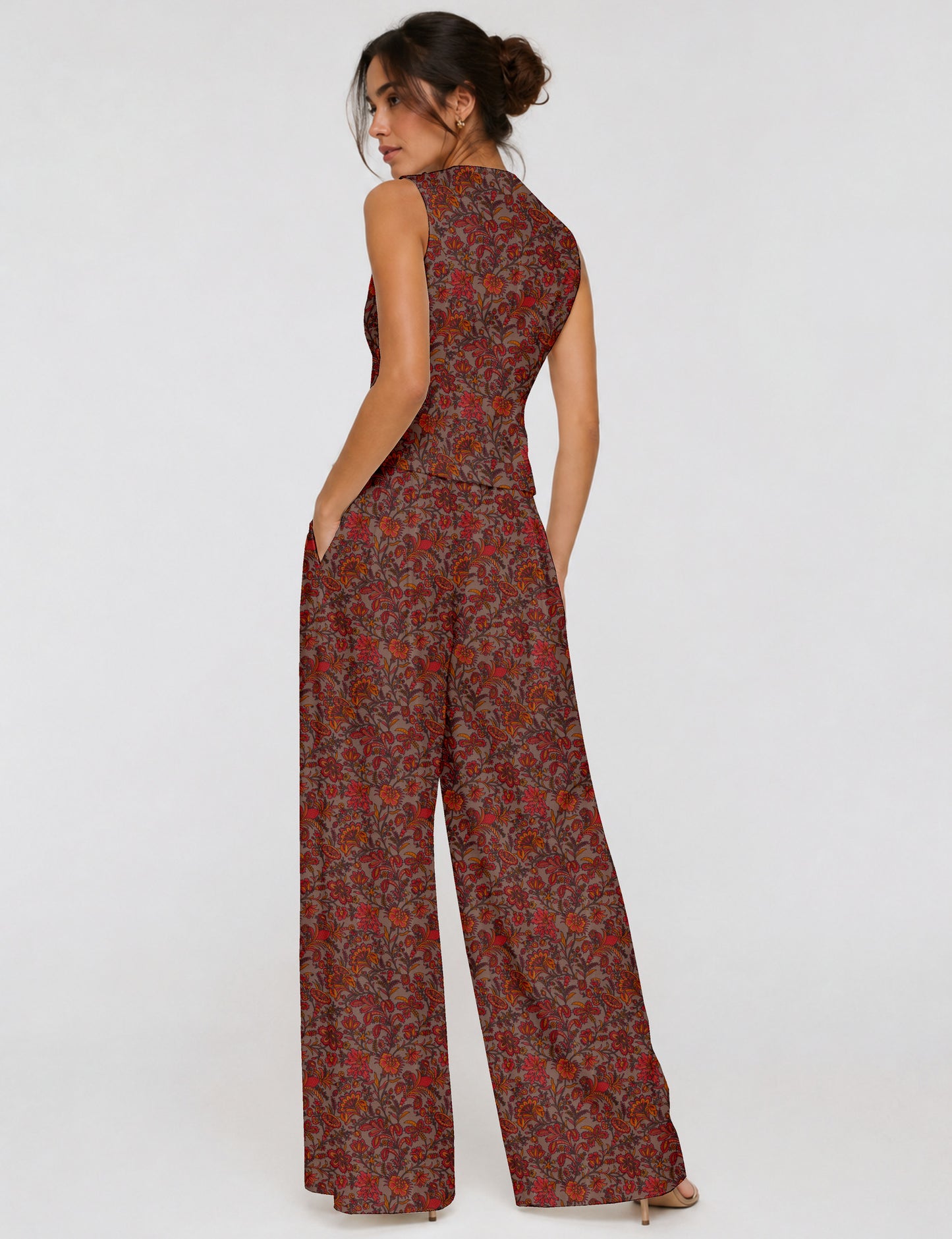Women's tailored waistcoat set with a sleeveless V-neck button-front waistcoat and high-rise wide leg trousers in a coordinated matching outfit.