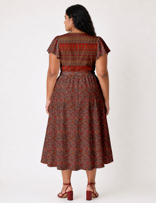 Elegant midi wrap dress with a V-neckline, adjustable waist tie, fitted bodice, and flared skirt for a timeless, flattering silhouette.