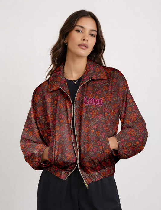 Love Bomber Jacket made from recycled fabric, featuring hand-stitched Aari embroidery. A unique piece of zero-waste clothing, part of the circular fashion movement. Designed with upcycled materials for a stylish yet environmentally friendly clothing choice.