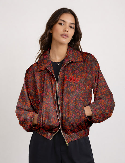 Love Bomber Jacket made from recycled fabric, featuring hand-stitched Aari embroidery. A unique piece of zero-waste clothing, part of the circular fashion movement. Designed with upcycled materials for a stylish yet environmentally friendly clothing choice.