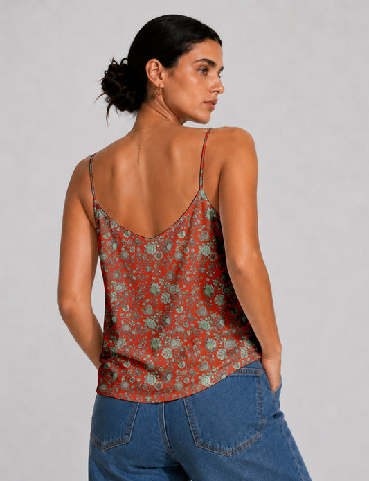 Women's sleeveless slip top with a relaxed straight fit, soft V-neckline, deep V-back, and delicate spaghetti straps.