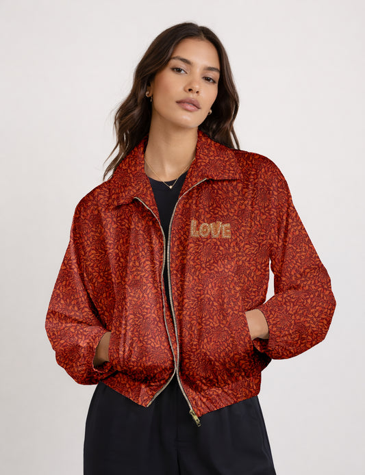 Love Bomber Jacket made from recycled fabric, featuring hand-stitched Aari embroidery. A unique piece of zero-waste clothing, part of the circular fashion movement. Designed with upcycled materials for a stylish yet environmentally friendly clothing choice.