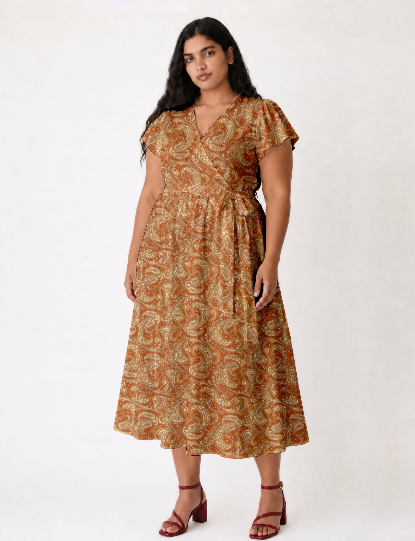 Midi wrap dress with V-neckline, fitted bodice, tie waist, and flared mid-calf skirt