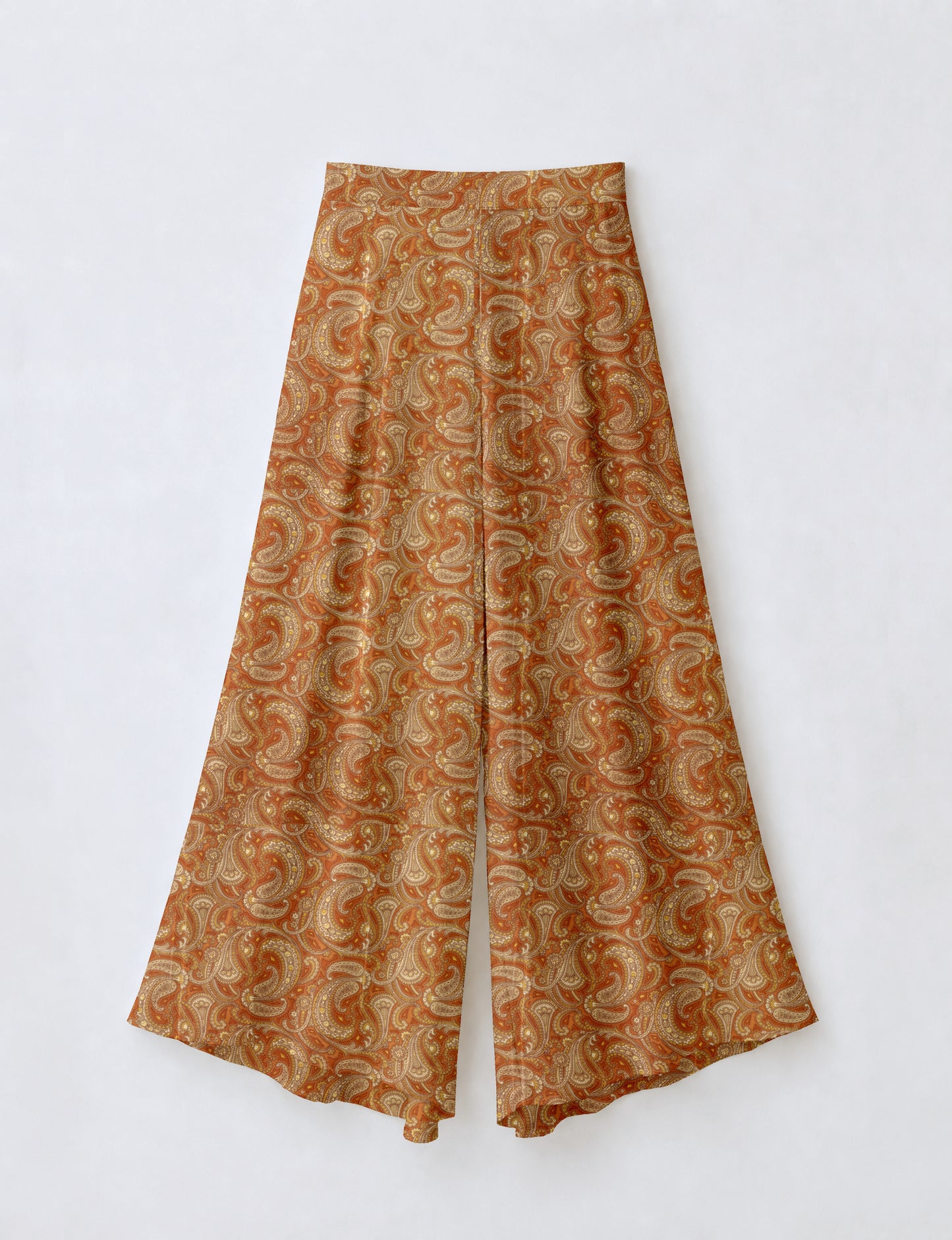 Orange paisley wide leg palazzo trousers flat lay with high waist and front seam detail