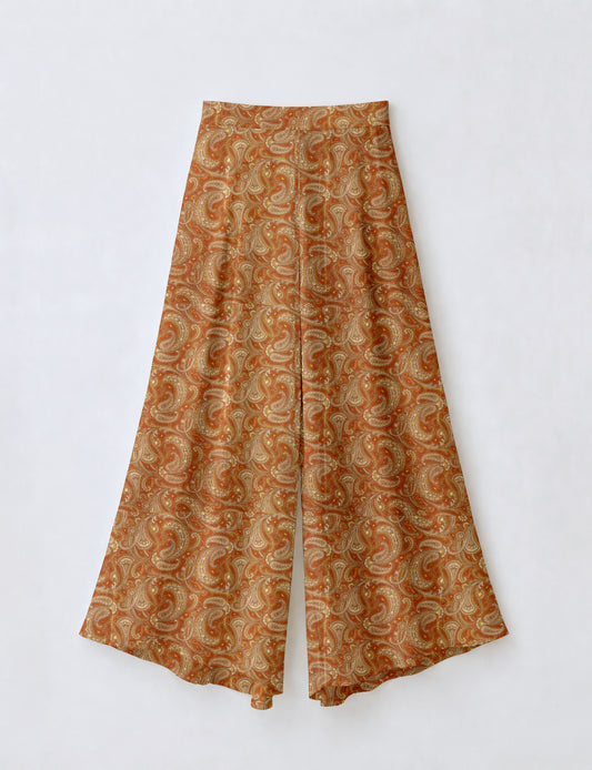 Women's wide leg palazzo trousers with a fitted waistband and relaxed flowing silhouette.