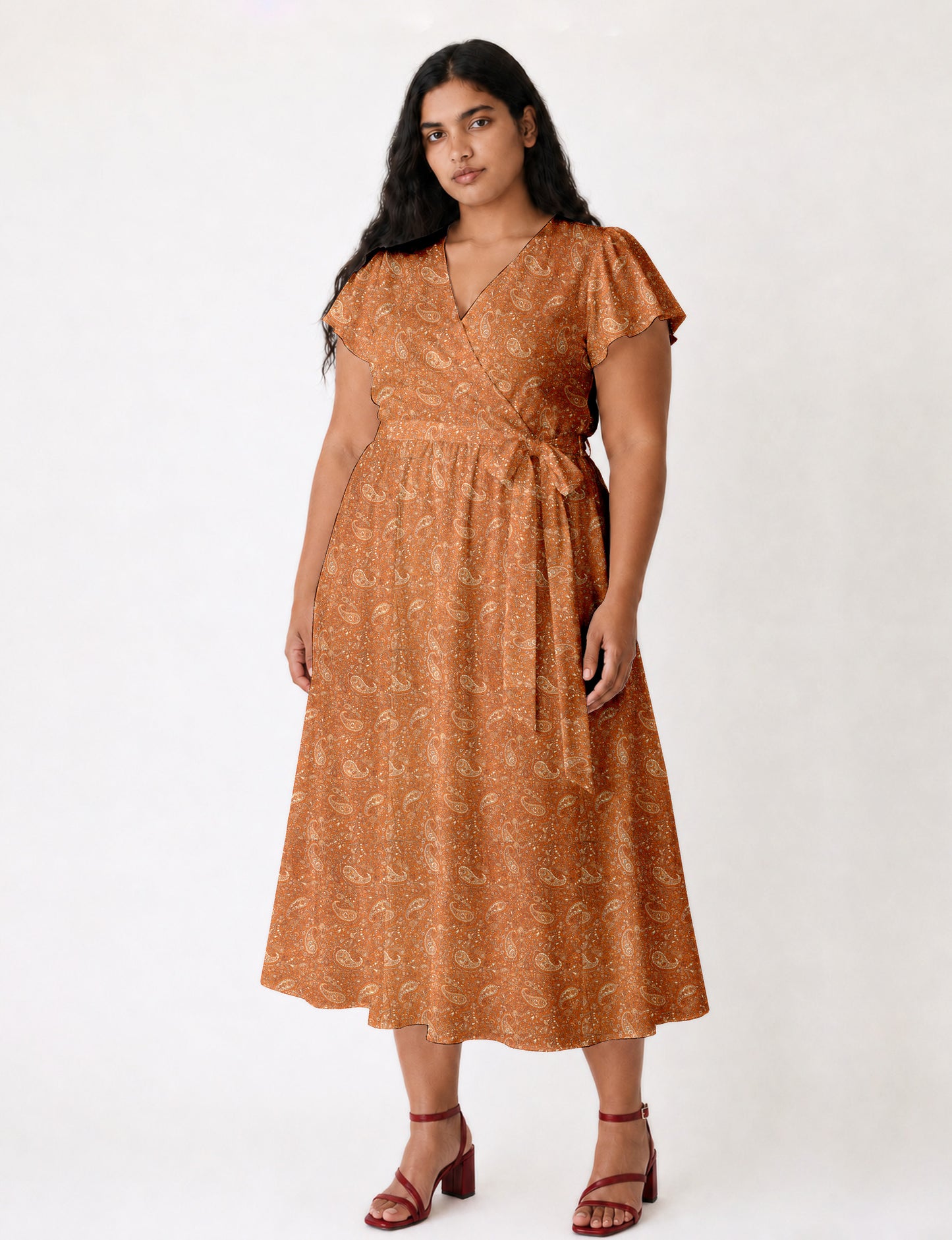 Elegant midi wrap dress with a V-neckline, adjustable waist tie, fitted bodice, and flared skirt for a timeless, flattering silhouette.