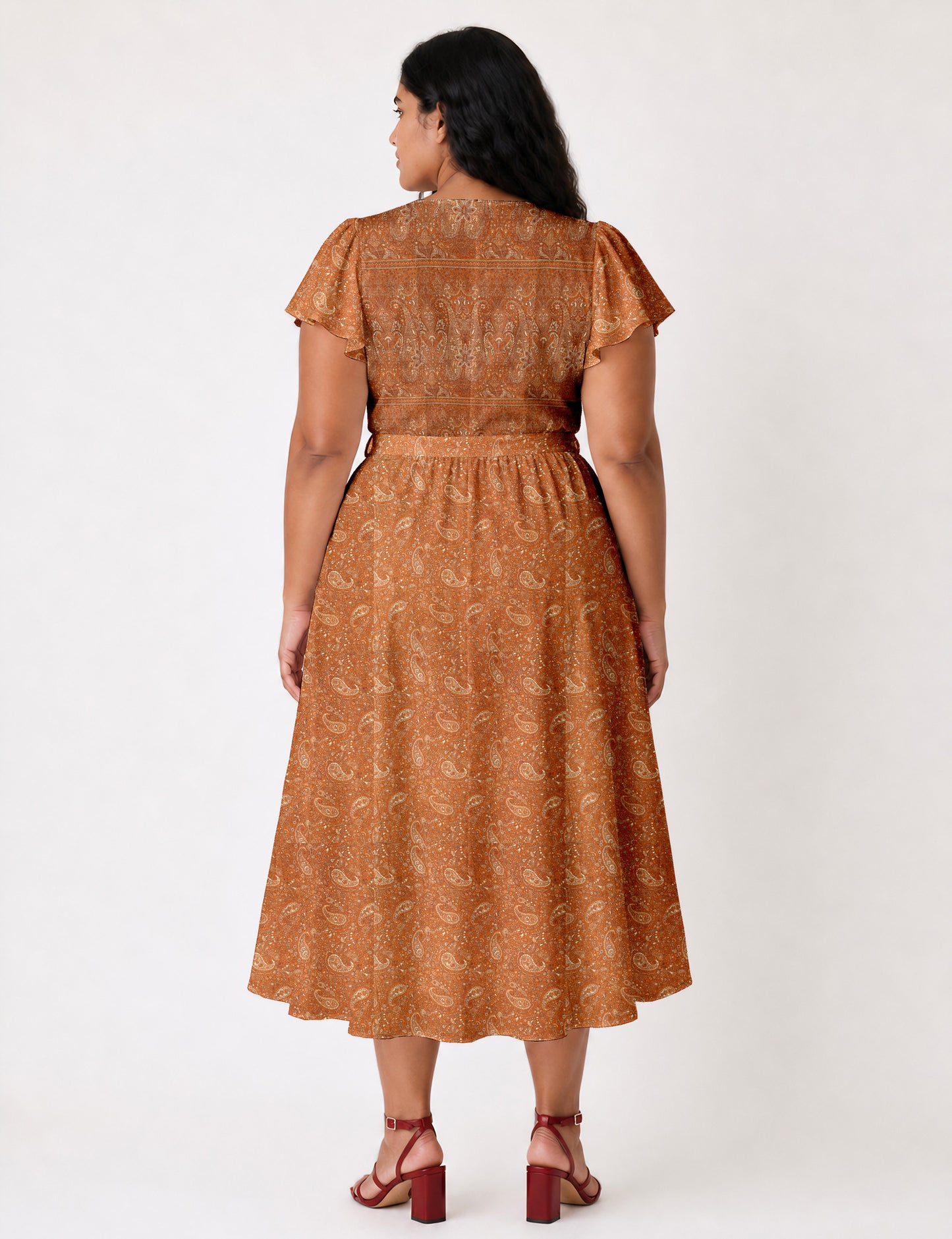 Elegant midi wrap dress with a V-neckline, adjustable waist tie, fitted bodice, and flared skirt for a timeless, flattering silhouette.