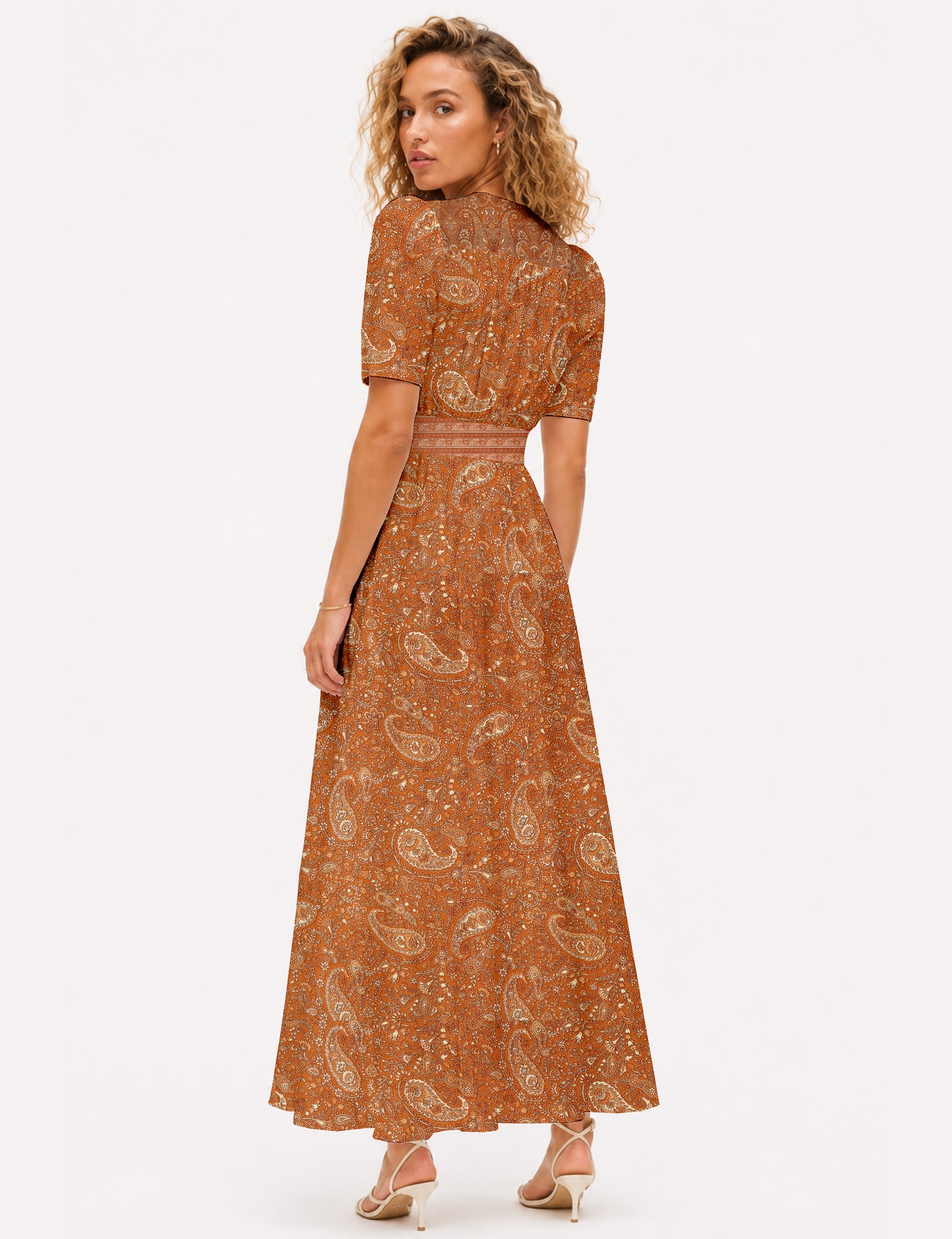 Maxi romantic dress with a fitted bodice, V-neckline, functional button placket, structured waist panel, short sleeves, and a softly flared ankle-length A-line skirt.