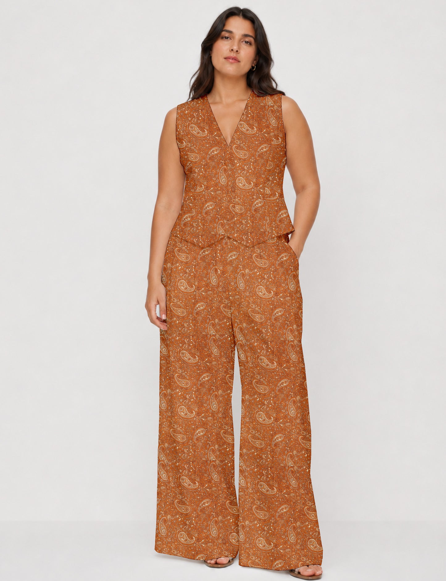 Women's tailored waistcoat set with a sleeveless V-neck button-front waistcoat and high-rise wide leg trousers in a coordinated matching outfit.