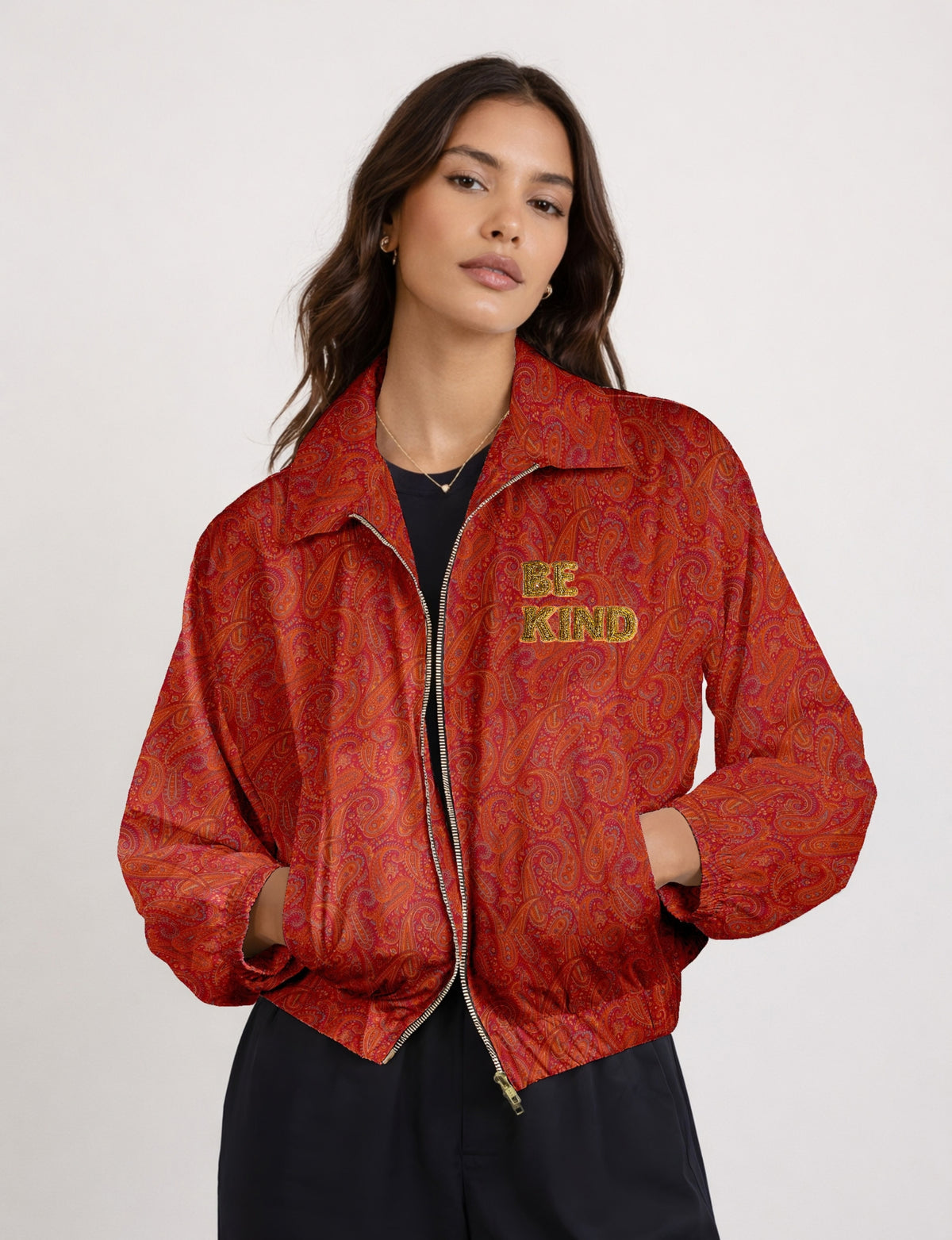 BE KIND Bomber jacket made from upcycled sari fabric with handcrafted Aari embroidery by female artisans.