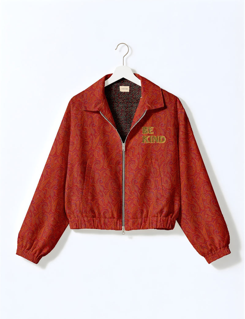 BE KIND Bomber jacket made from upcycled sari fabric with handcrafted Aari embroidery by female artisans.