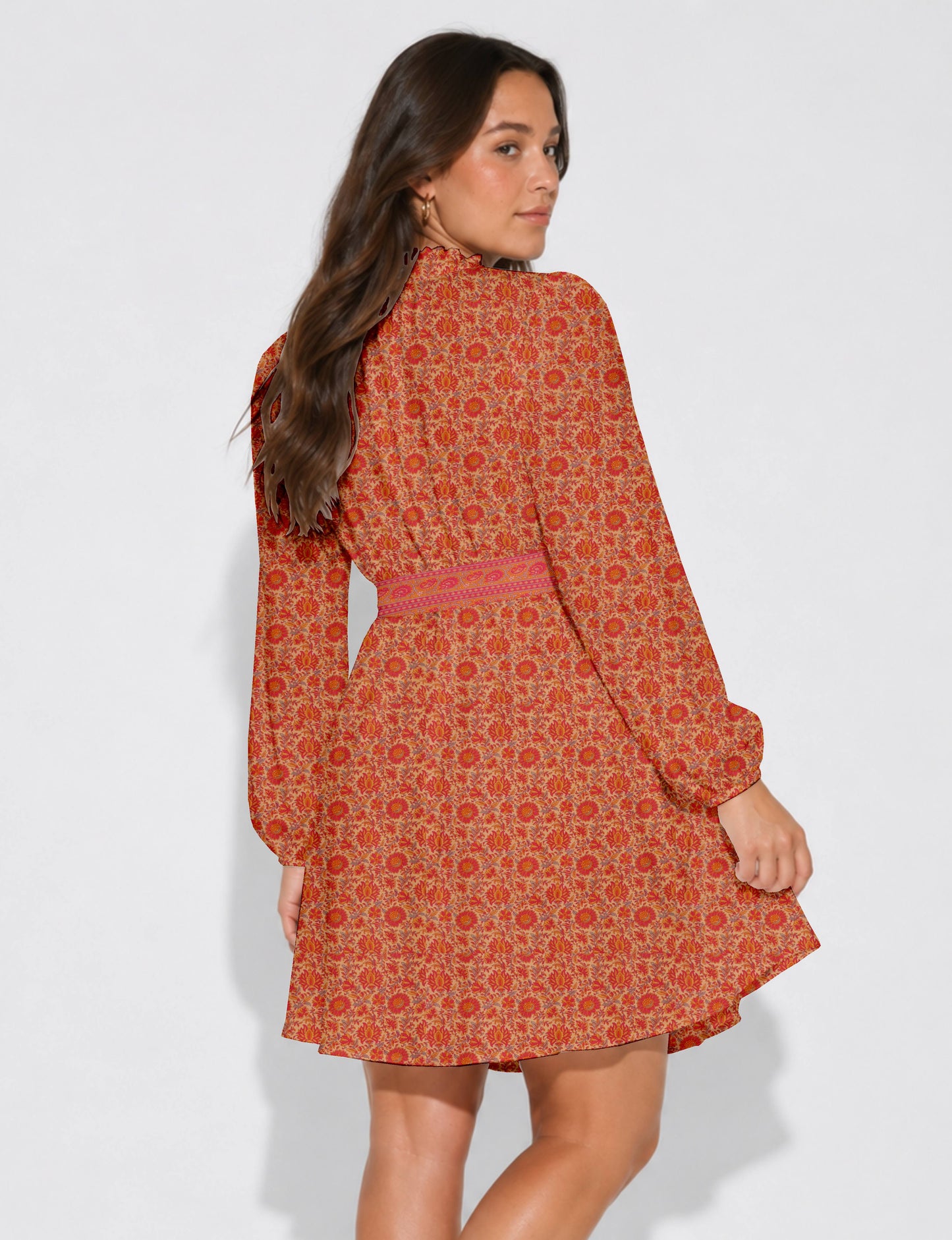 Swing dress with detachable tie belt, gathered ruffle neckline, full-length voluminous sleeves, elastic cuffs, and relaxed A-line silhouette in an above-knee length.
