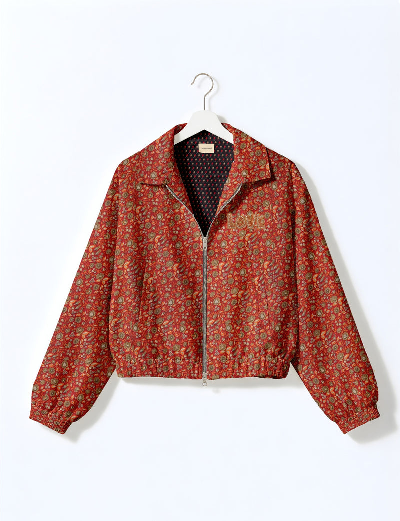 Love Bomber Jacket made from recycled fabric, featuring hand-stitched Aari embroidery. A unique piece of zero-waste clothing, part of the circular fashion movement. Designed with upcycled materials for a stylish yet environmentally friendly clothing choice.