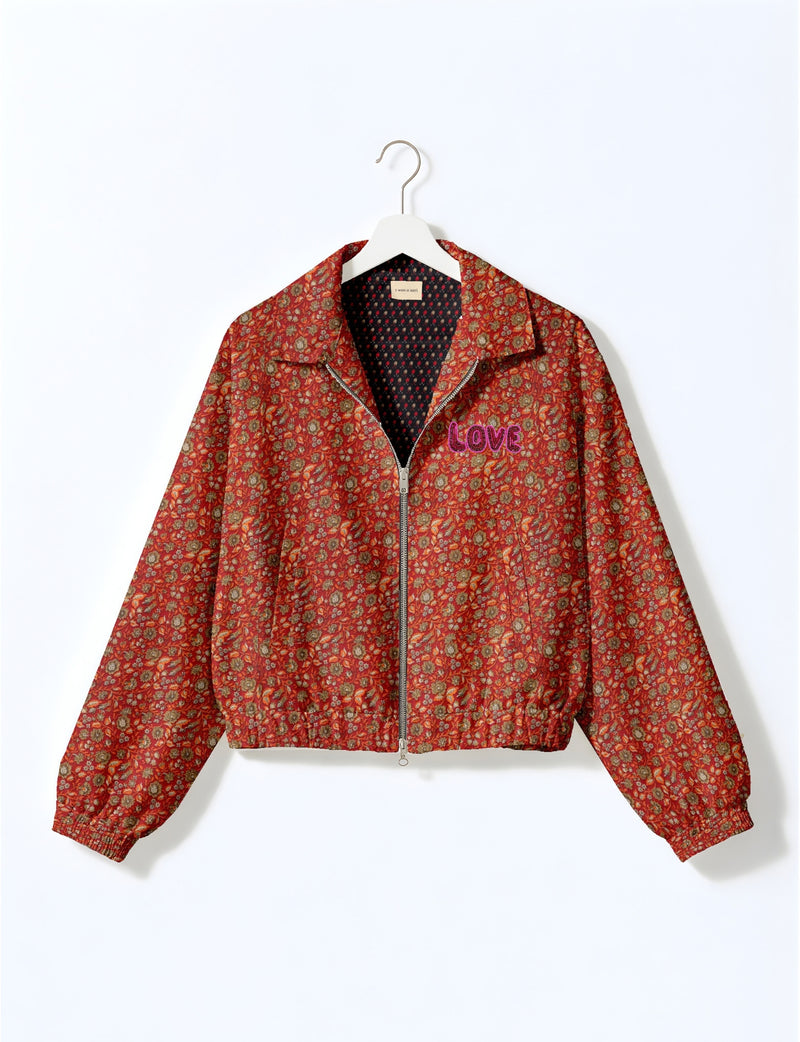 Love Bomber Jacket made from recycled fabric, featuring hand-stitched Aari embroidery. A unique piece of zero-waste clothing, part of the circular fashion movement. Designed with upcycled materials for a stylish yet environmentally friendly clothing choice.
