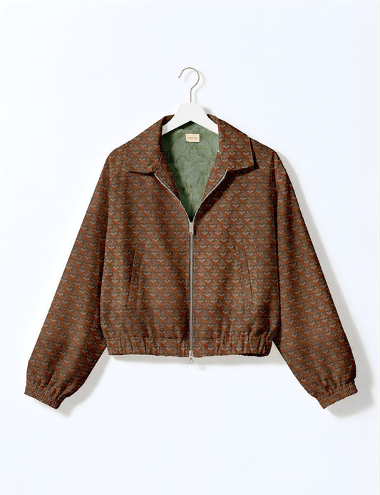 Upcycled Bomber Jacket made from recycled sari materials, featuring a cute cropped shape, elasticated hem and cuffs, and contrast sari print lining. Sustainable apparel promoting eco-friendly fashion and ethical clothing.