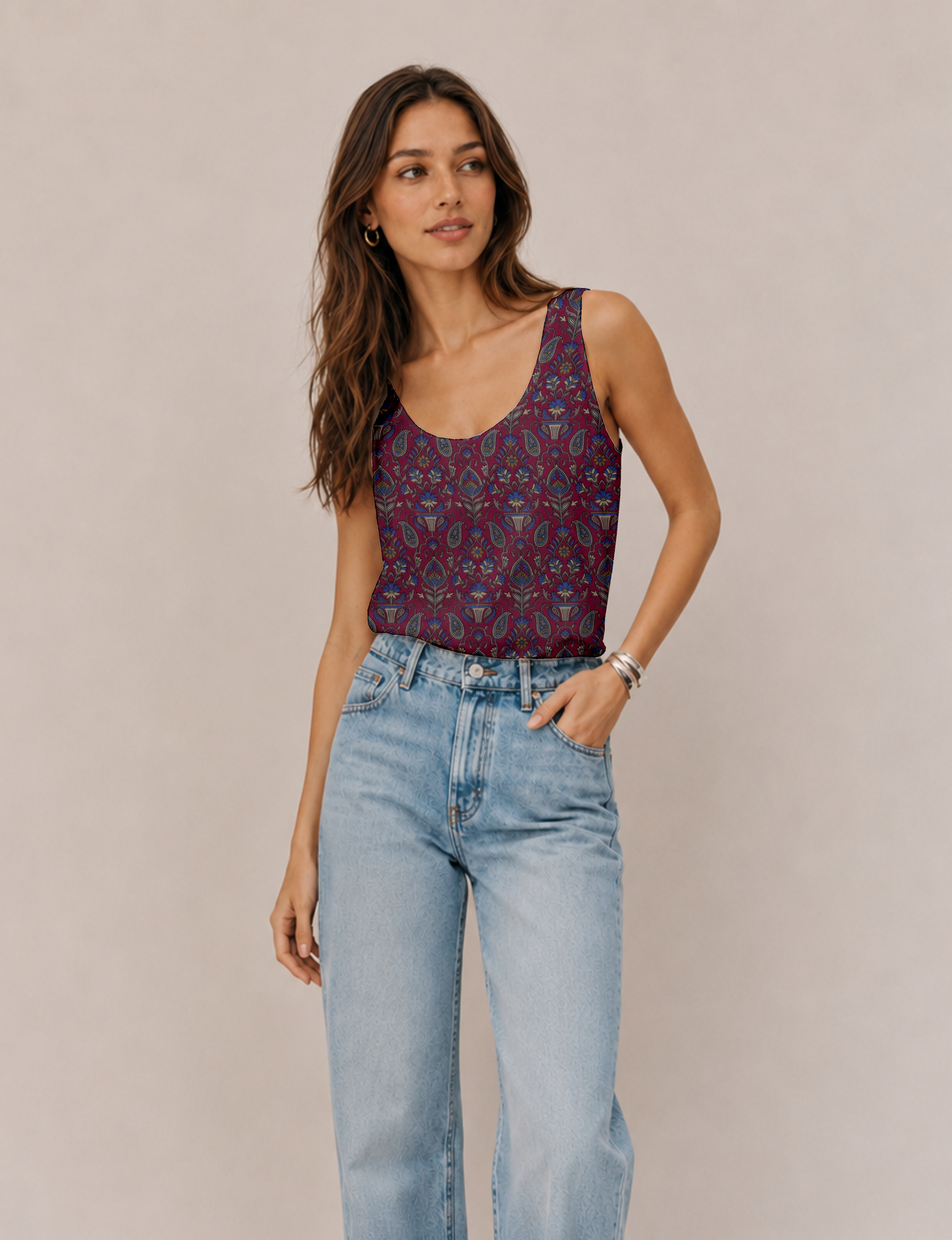 Women's sleeveless blouse with a relaxed straight fit, wide scoop neckline, deep scoop back, and hip-length silhouette.