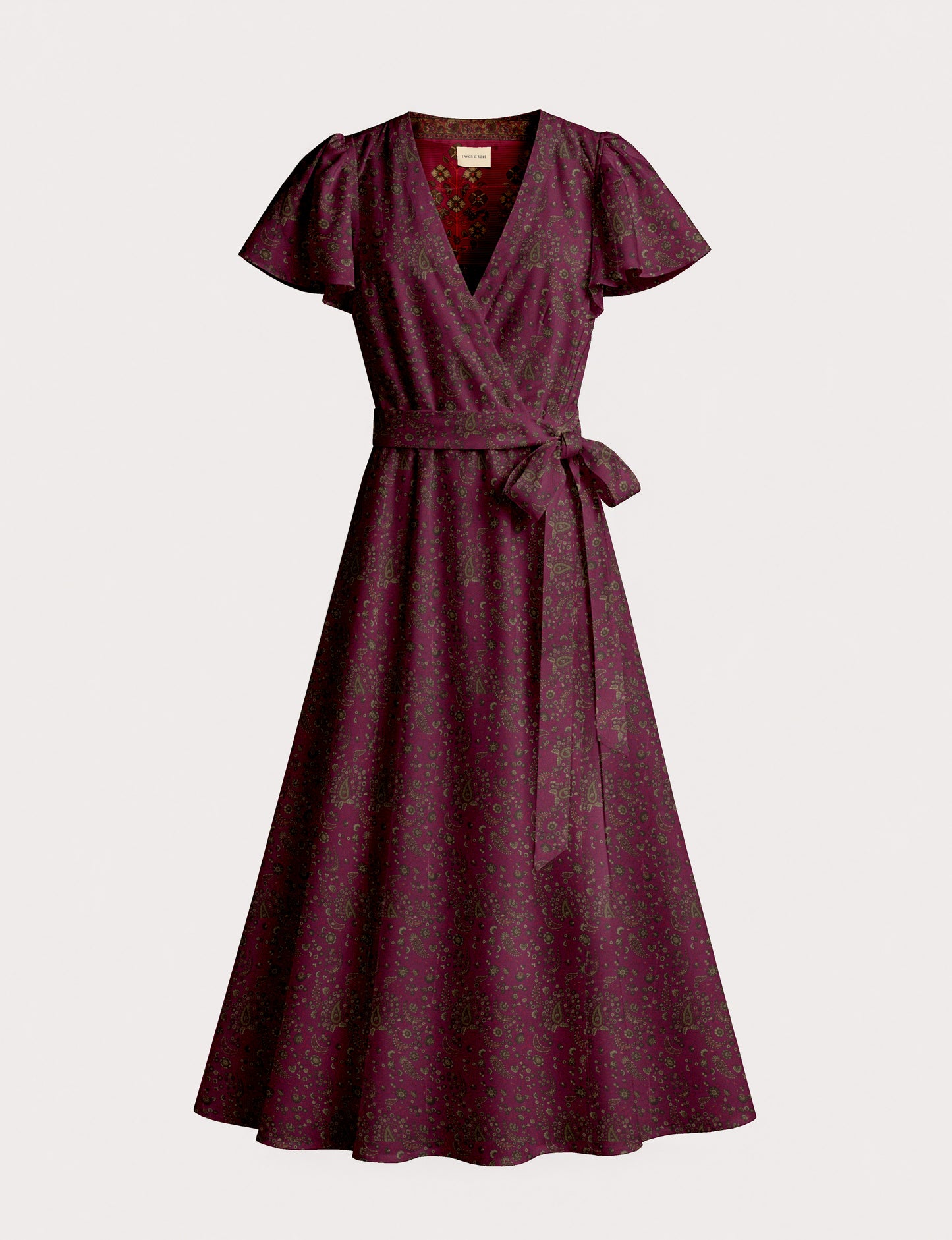 Midi wrap dress with V-neckline, fitted bodice, tie waist, and flared mid-calf skirt