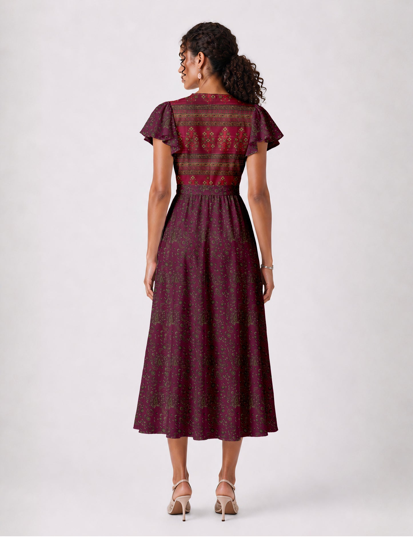 Midi wrap dress with V-neckline, fitted bodice, tie waist, and flared mid-calf skirt