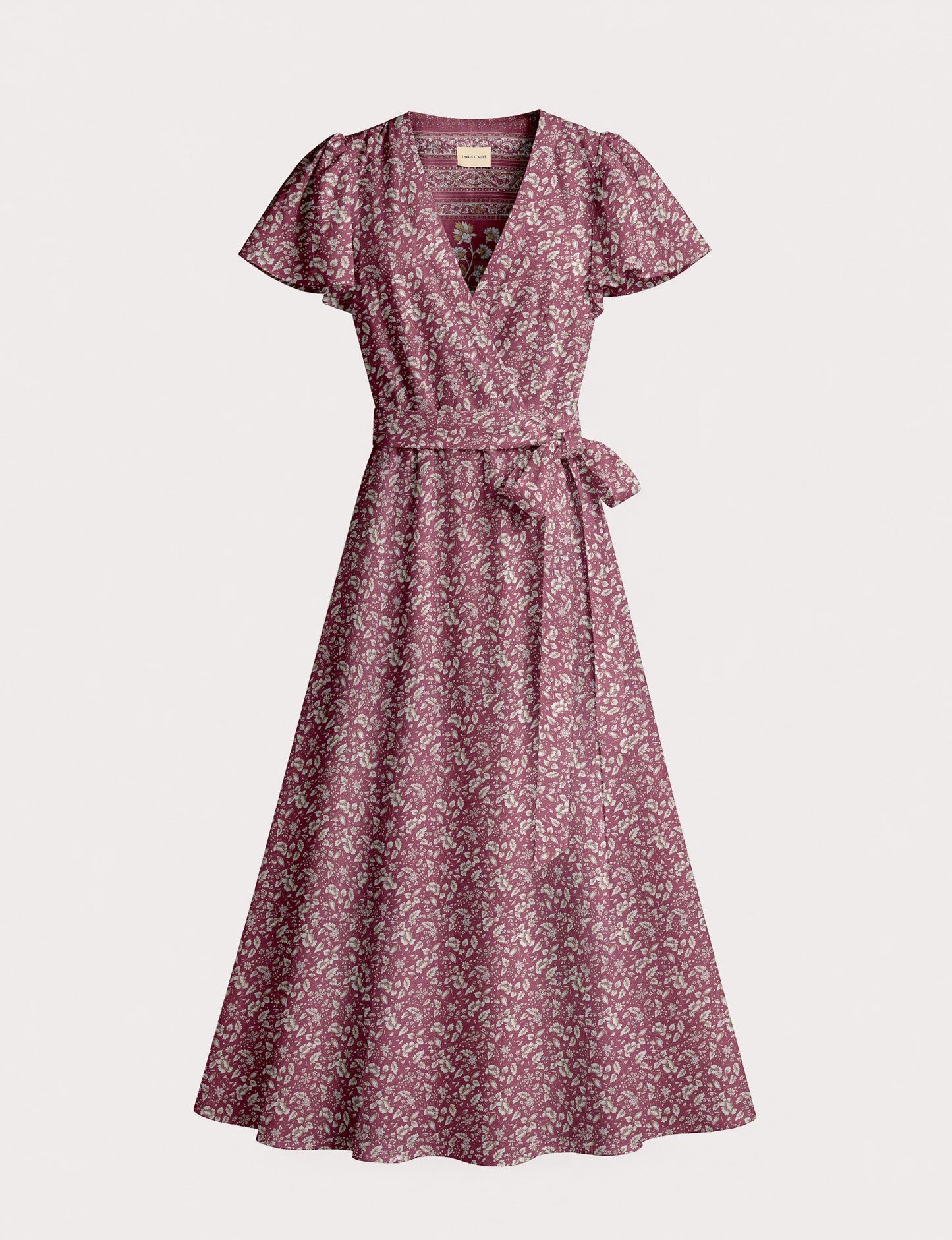 Elegant midi wrap dress with a V-neckline, adjustable waist tie, fitted bodice, and flared skirt for a timeless, flattering silhouette.