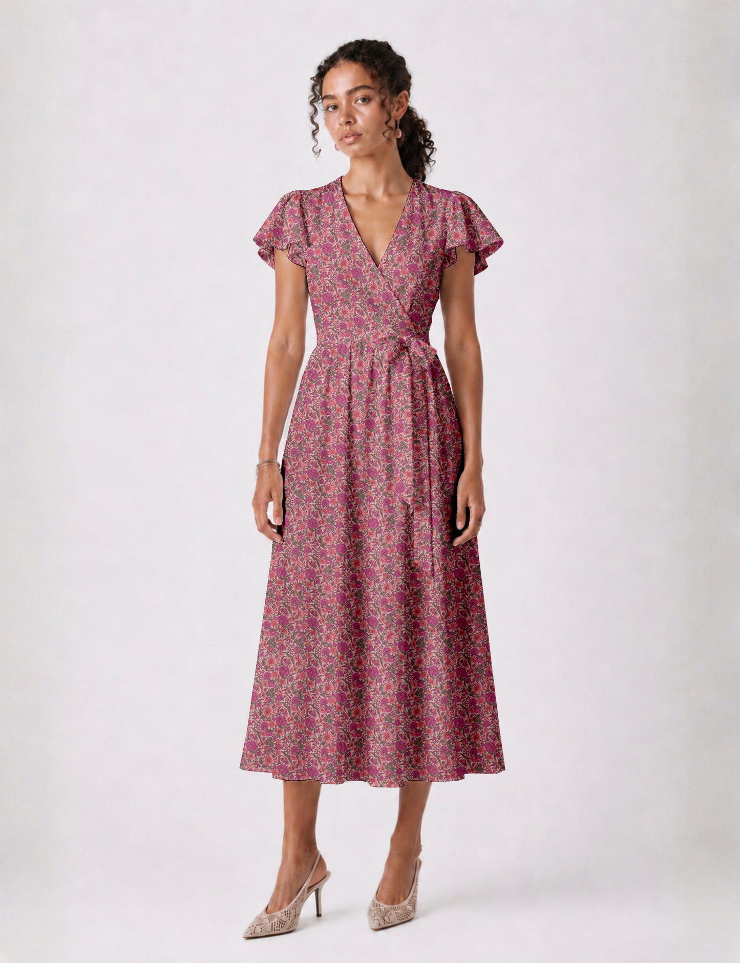 Elegant midi wrap dress with a V-neckline, adjustable waist tie, fitted bodice, and flared skirt for a timeless, flattering silhouette.