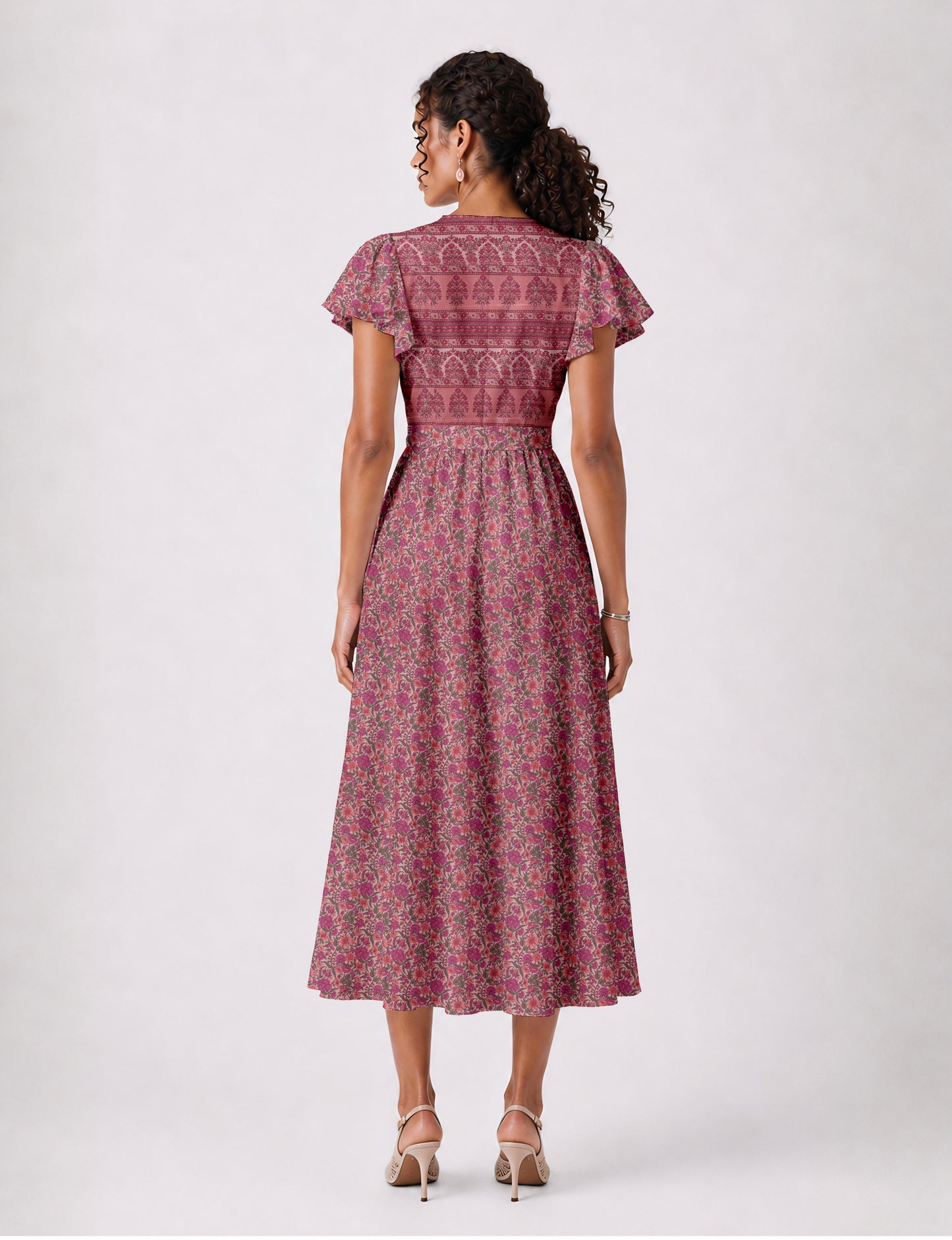 Elegant midi wrap dress with a V-neckline, adjustable waist tie, fitted bodice, and flared skirt for a timeless, flattering silhouette.