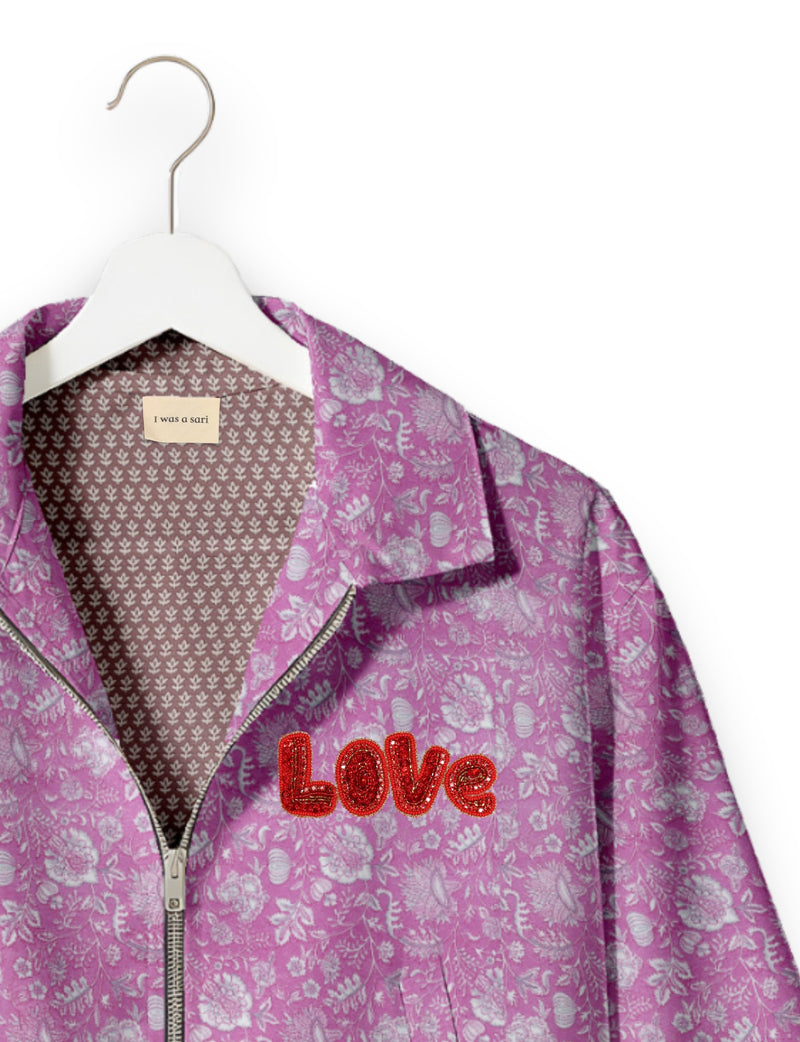 Love Bomber Jacket made from recycled fabric, featuring hand-stitched Aari embroidery. A unique piece of zero-waste clothing, part of the circular fashion movement. Designed with upcycled materials for a stylish yet environmentally friendly clothing choice.