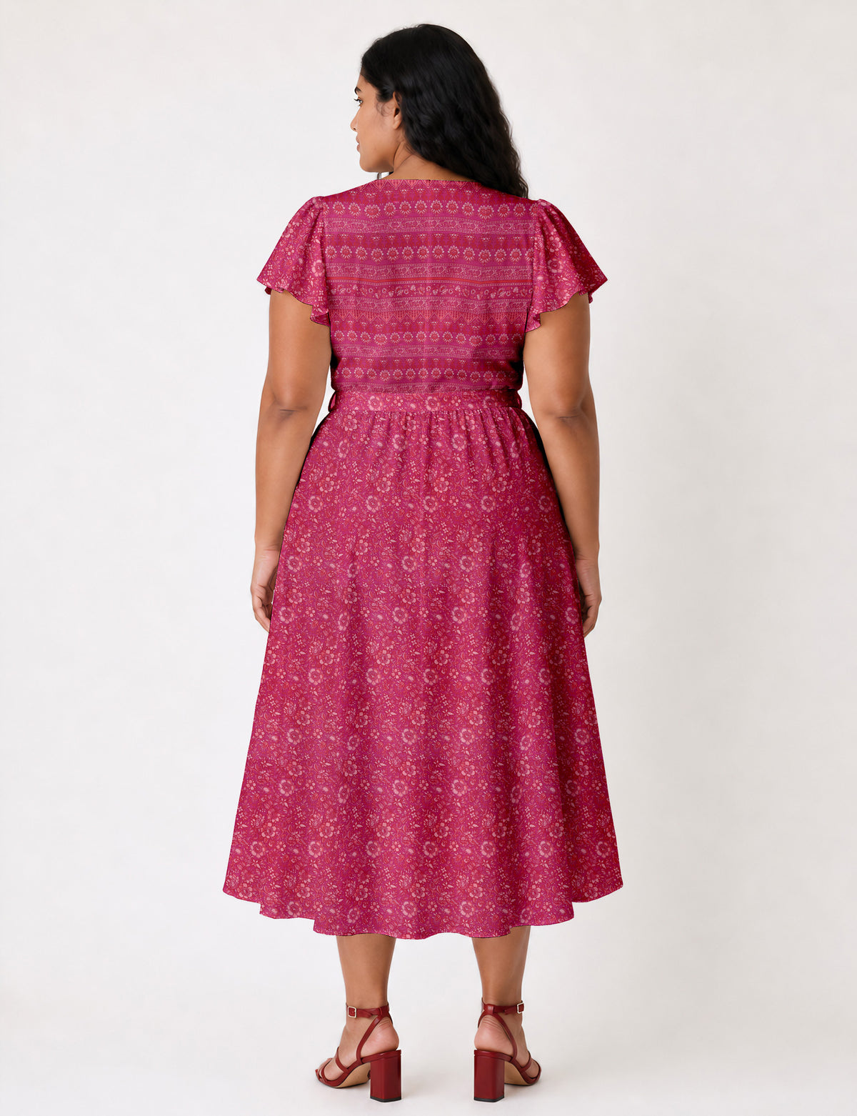 Elegant midi wrap dress with a V-neckline, adjustable waist tie, fitted bodice, and flared skirt for a timeless, flattering silhouette.