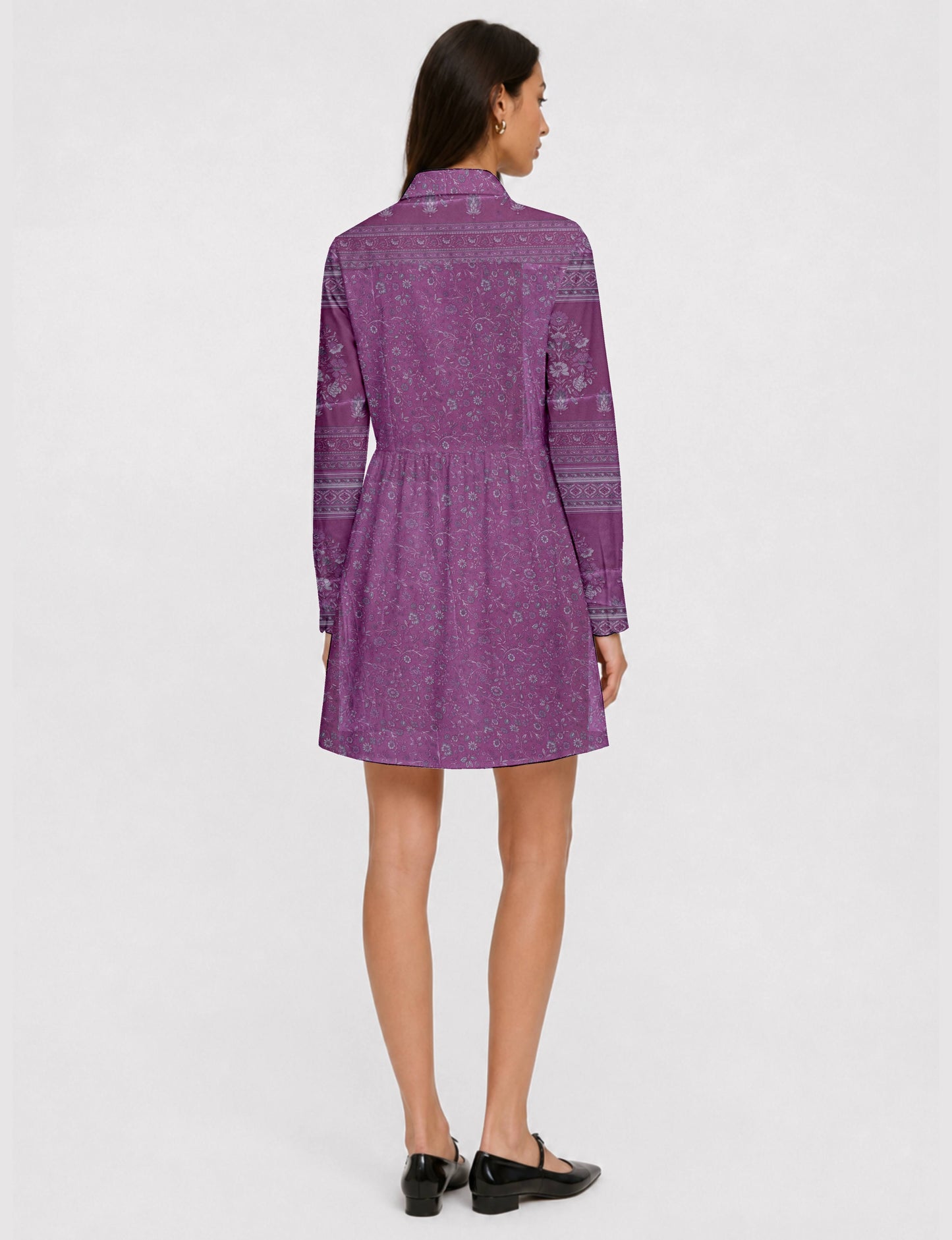 Short shirt dress with a relaxed A-line silhouette, point collar, partial button placket, gathered waist, side pockets, and full-length cuffed sleeves.