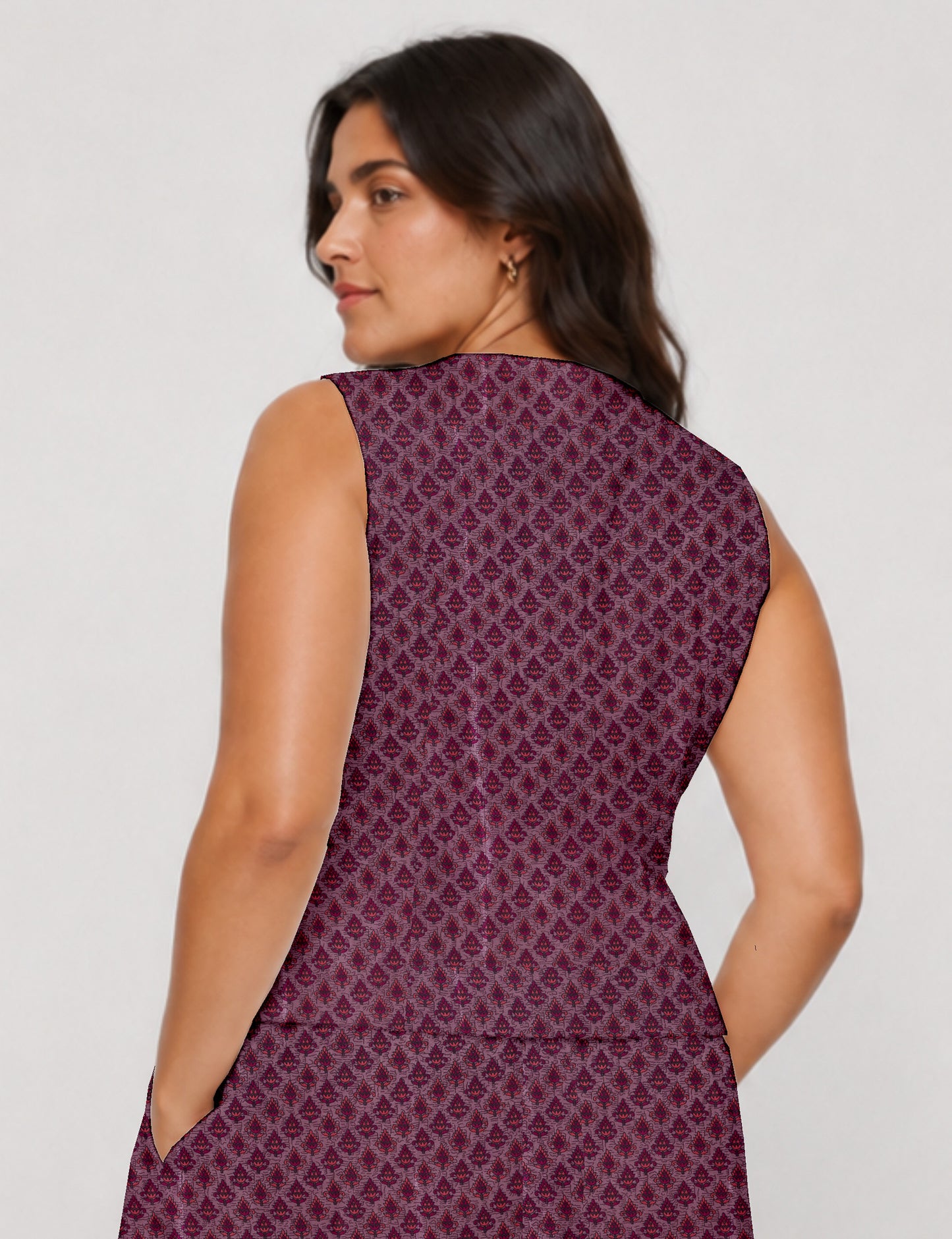 Women's fitted waistcoat with V-neck, single-breasted button closure, tailored silhouette, and pointed hem in sustainable fashion.