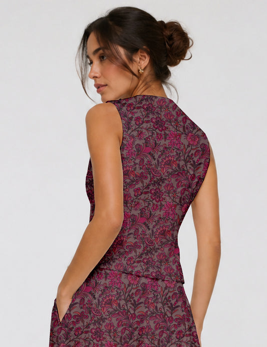 Women's fitted waistcoat with V-neck, single-breasted button closure, tailored silhouette, and pointed hem in sustainable fashion.