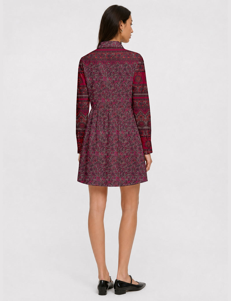 Short shirt dress with a relaxed A-line silhouette, point collar, partial button placket, gathered waist, side pockets, and full-length cuffed sleeves.