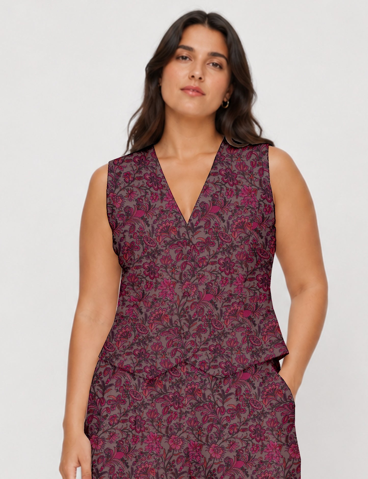 Women's fitted waistcoat with V-neck, single-breasted button closure, tailored silhouette, and pointed hem in sustainable fashion.
