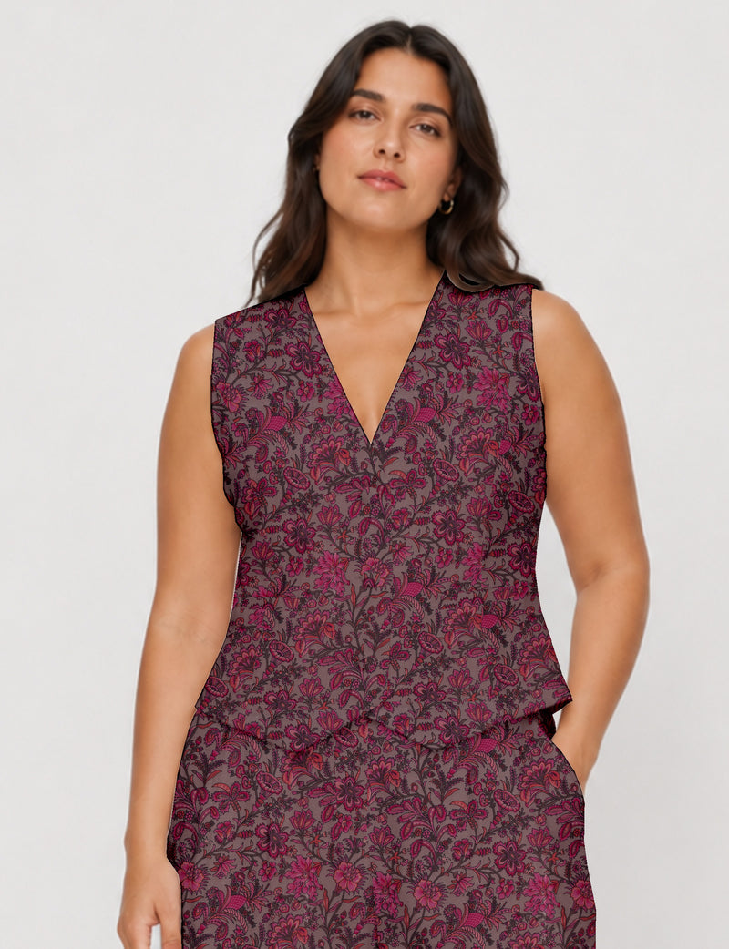 Women's fitted waistcoat with V-neck, single-breasted button closure, tailored silhouette, and pointed hem in sustainable fashion.