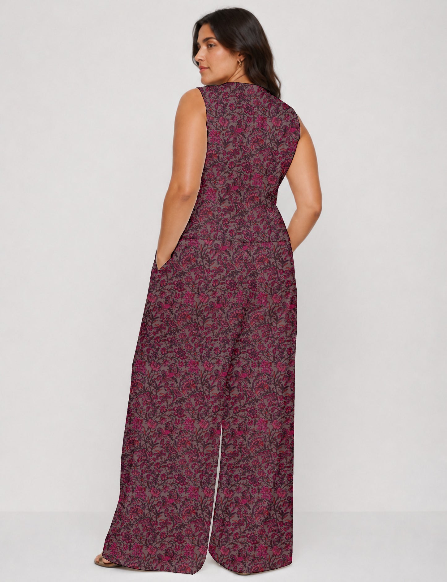 Women's tailored waistcoat set with a sleeveless V-neck button-front waistcoat and high-rise wide leg trousers in a coordinated matching outfit.