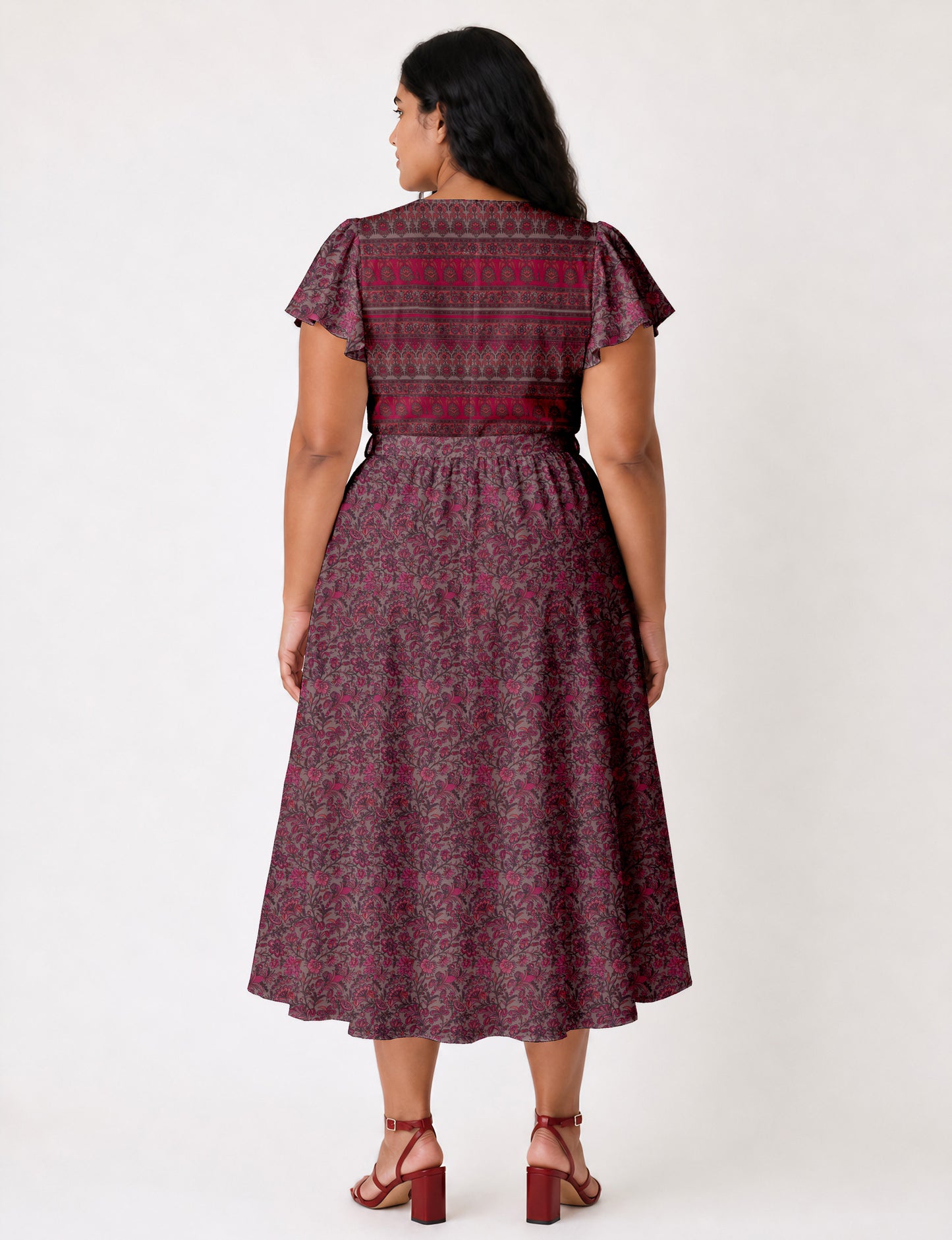 Elegant midi wrap dress with a V-neckline, adjustable waist tie, fitted bodice, and flared skirt for a timeless, flattering silhouette.