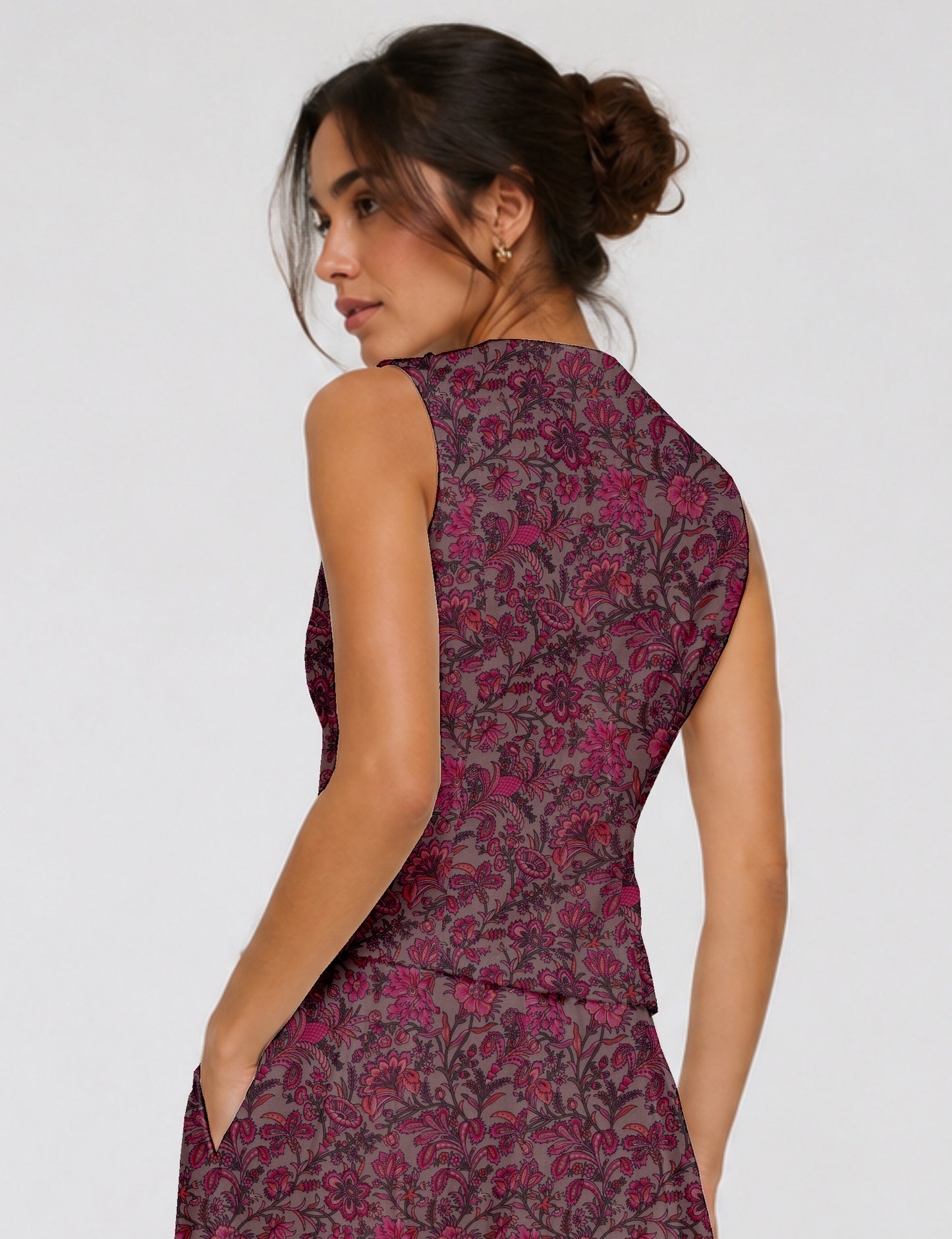 Women's fitted waistcoat with V-neck, single-breasted button closure, tailored silhouette, and pointed hem in sustainable fashion.