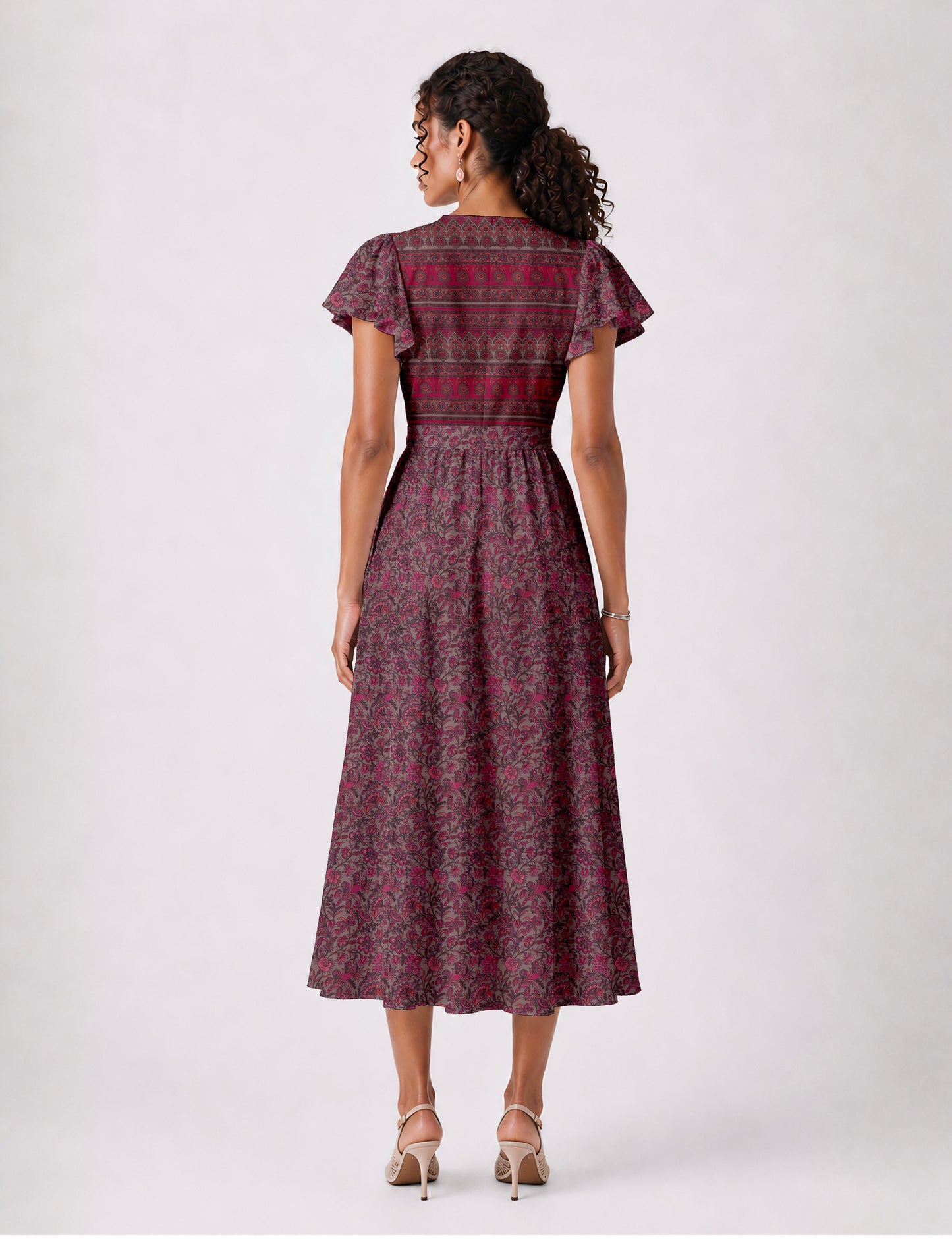 Elegant midi wrap dress with a V-neckline, adjustable waist tie, fitted bodice, and flared skirt for a timeless, flattering silhouette.