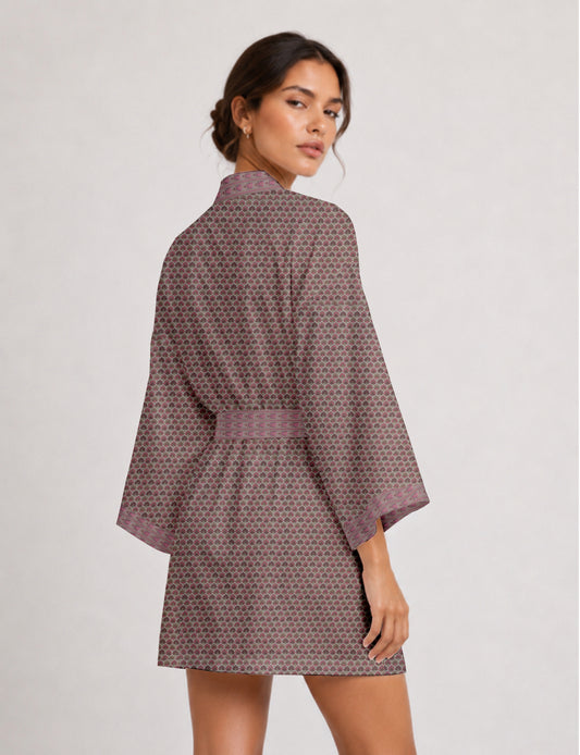 Short kimono robe with wrap front, V-neckline, wide sleeves, waist tie, and concealed skort detail.