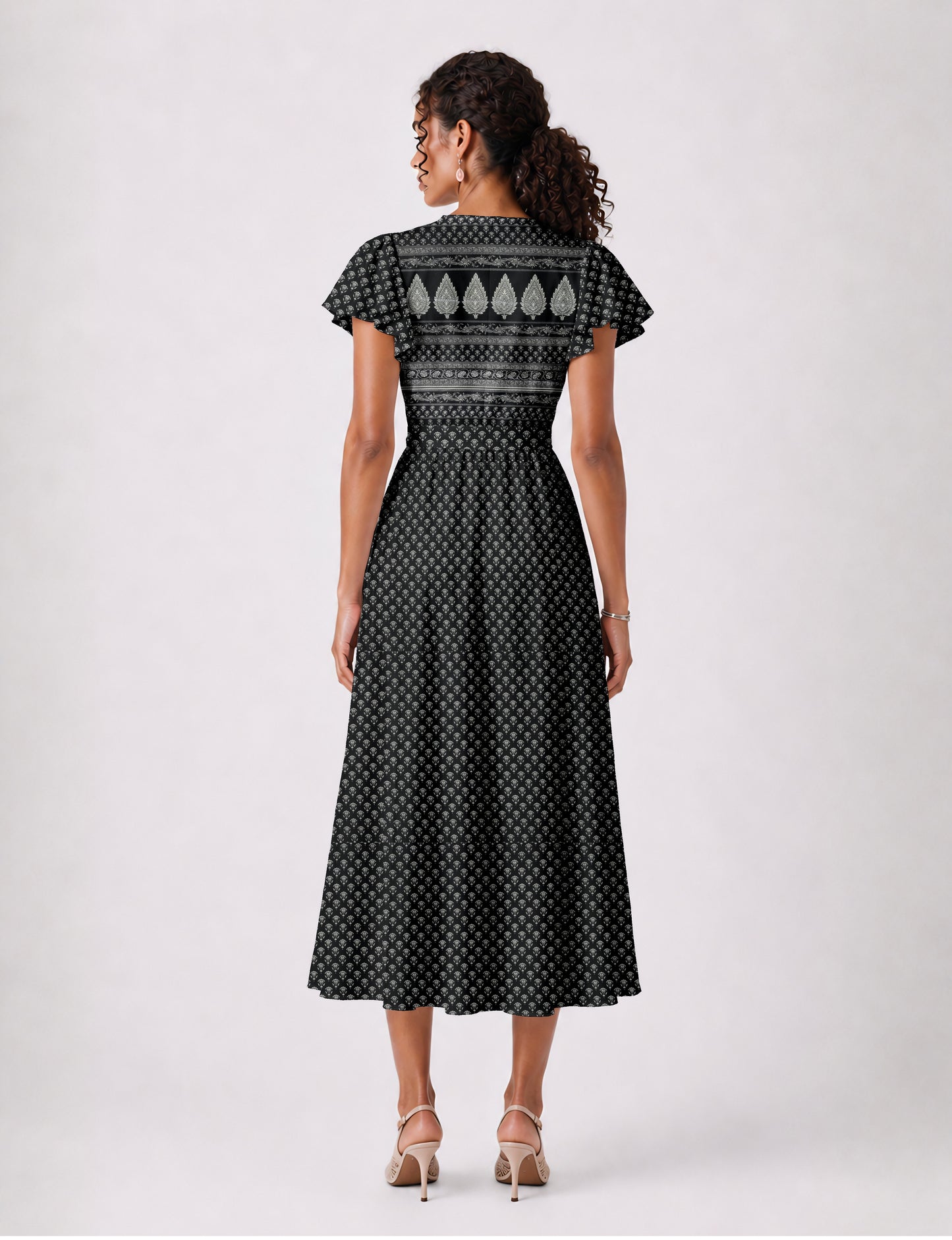 Midi wrap dress with V-neckline, fitted bodice, tie waist, and flared mid-calf skirt