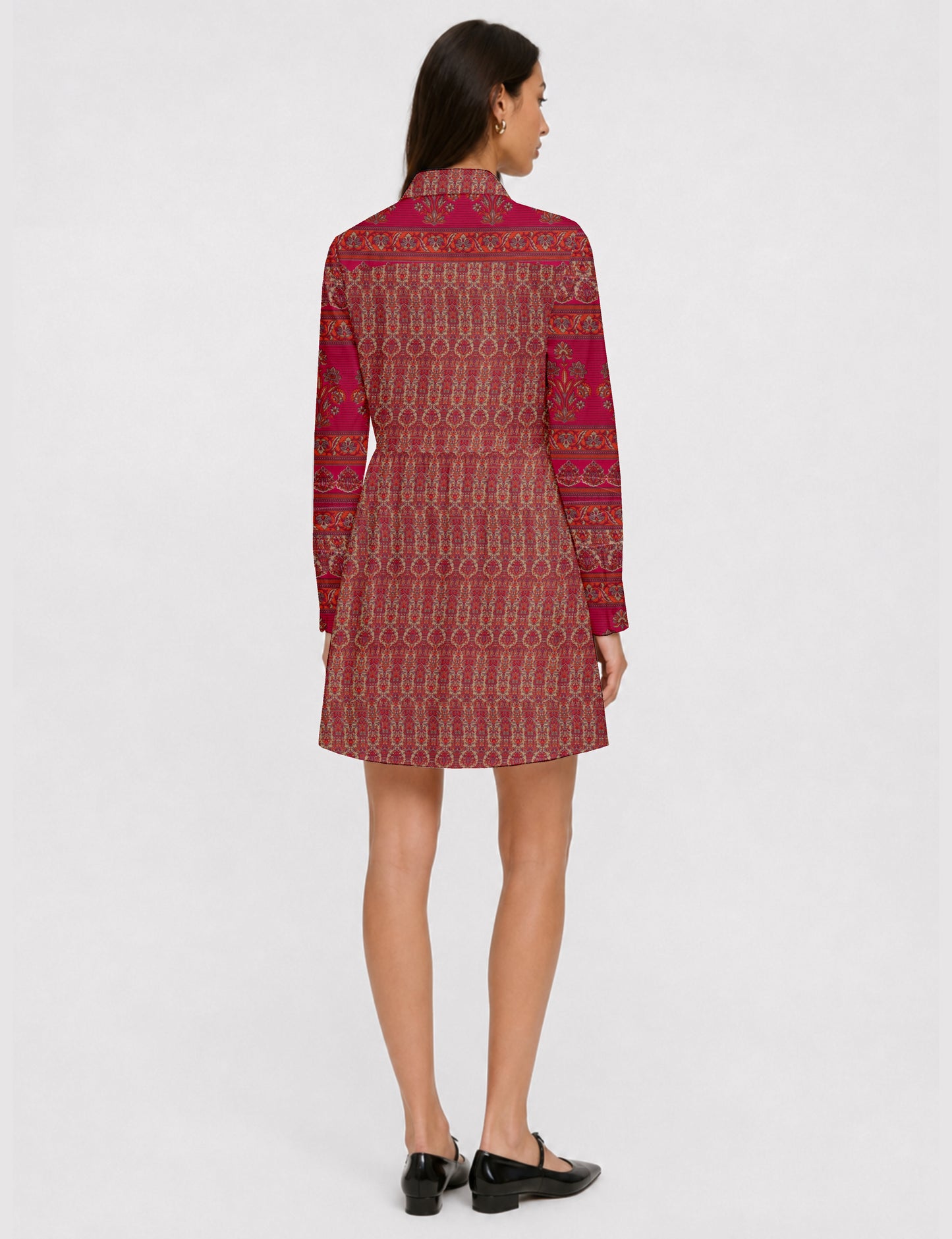 Short shirt dress with a relaxed A-line silhouette, point collar, partial button placket, gathered waist, side pockets, and full-length cuffed sleeves.