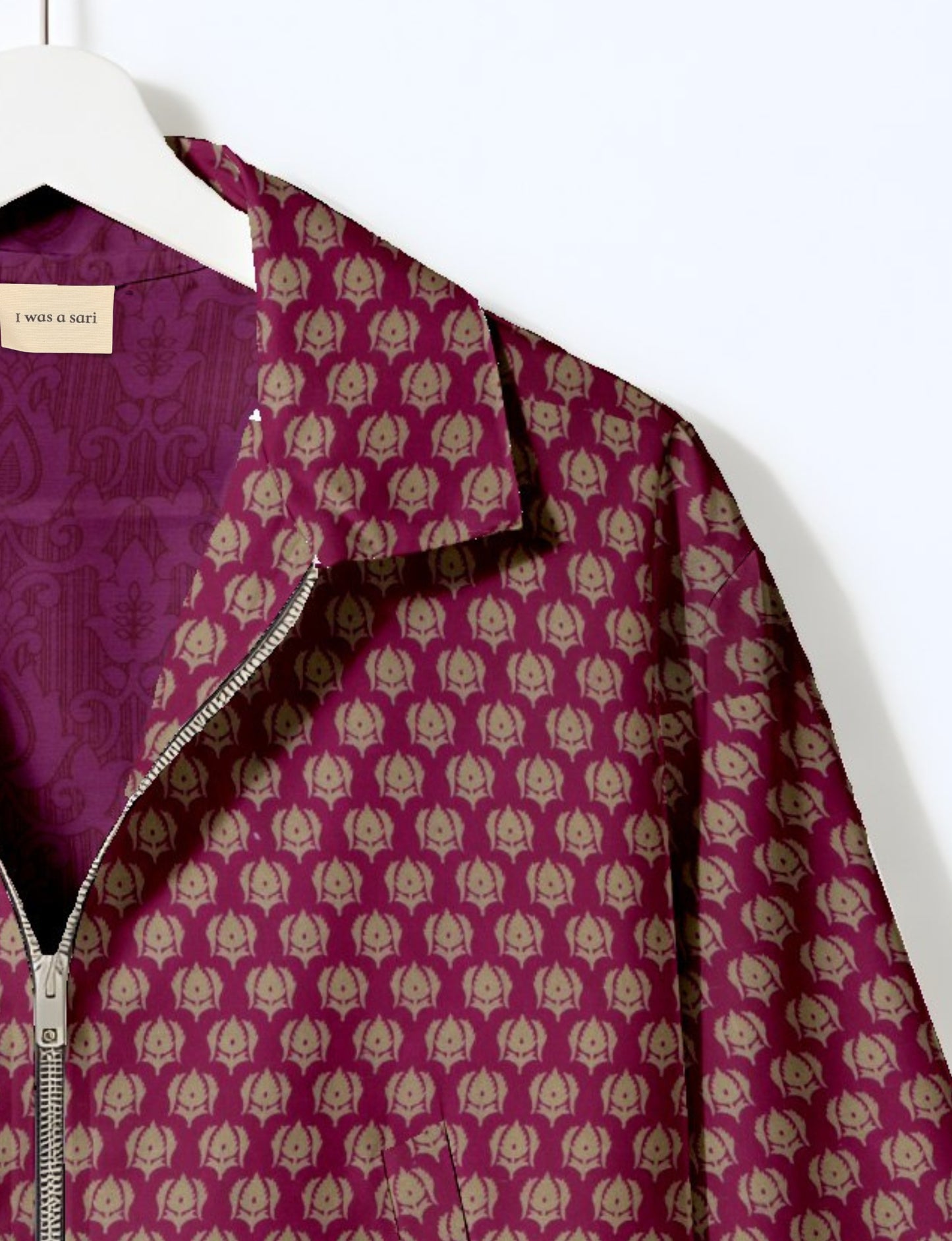 Upcycled Bomber Jacket made from recycled sari materials, featuring a cute cropped shape, elasticated hem and cuffs, and contrast sari print lining. Sustainable apparel promoting eco-friendly fashion and ethical clothing.