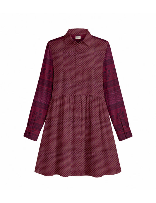 Short shirt dress with a relaxed A-line silhouette, point collar, partial button placket, gathered waist, side pockets, and full-length cuffed sleeves.