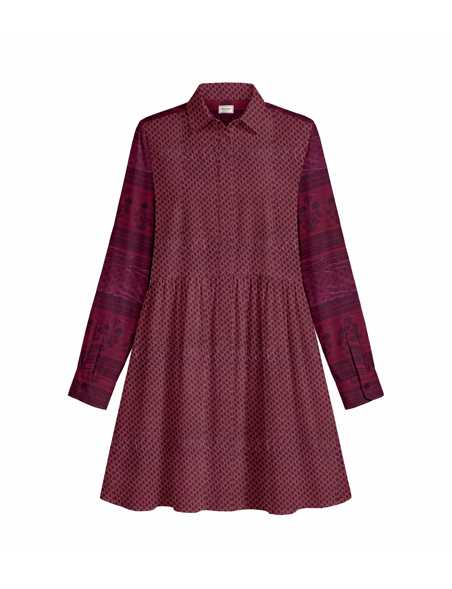 Short shirt dress with a relaxed A-line silhouette, point collar, partial button placket, gathered waist, side pockets, and full-length cuffed sleeves.