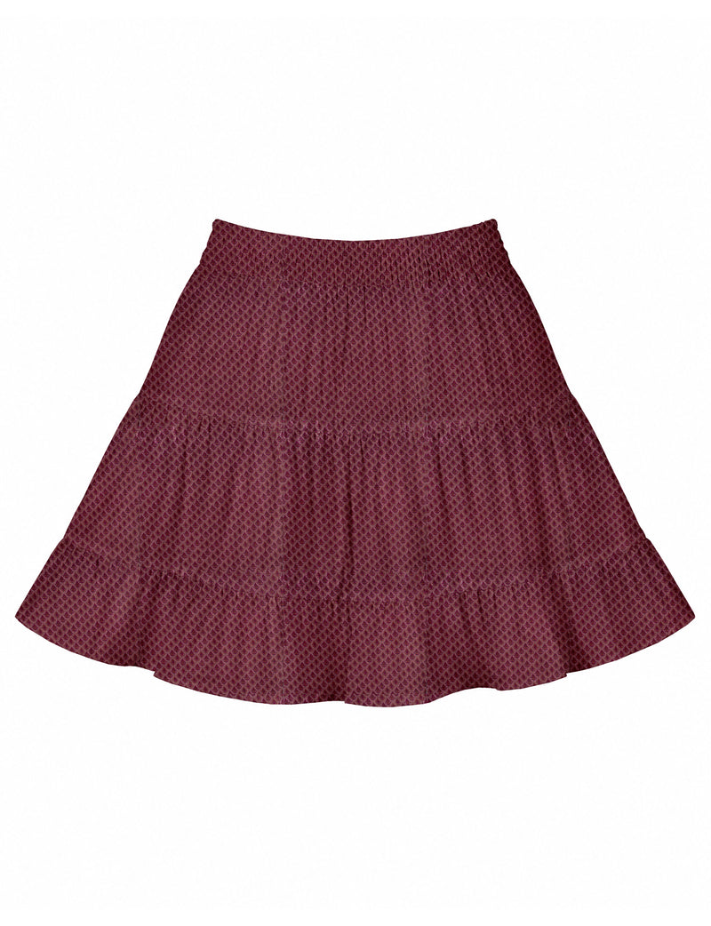 Short tiered skirt in dark pink with small leaf pattern, elastic waistband, and flared hem, flat lay front view