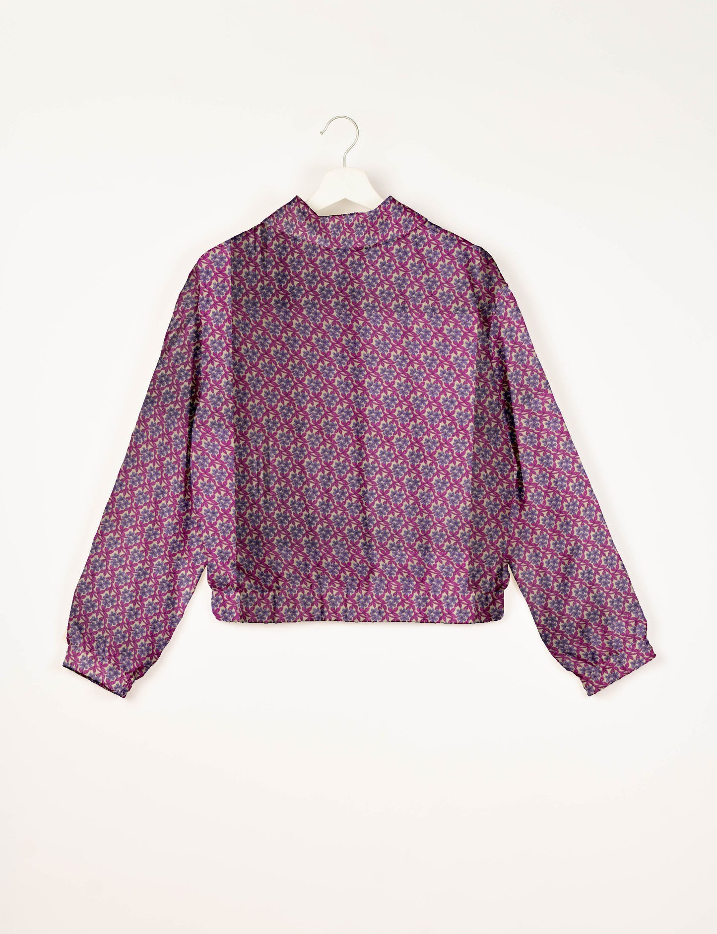 Love Bomber Jacket made from recycled fabric, featuring hand-stitched Aari embroidery. A unique piece of zero-waste clothing, part of the circular fashion movement. Designed with upcycled materials for a stylish yet environmentally friendly clothing choice.