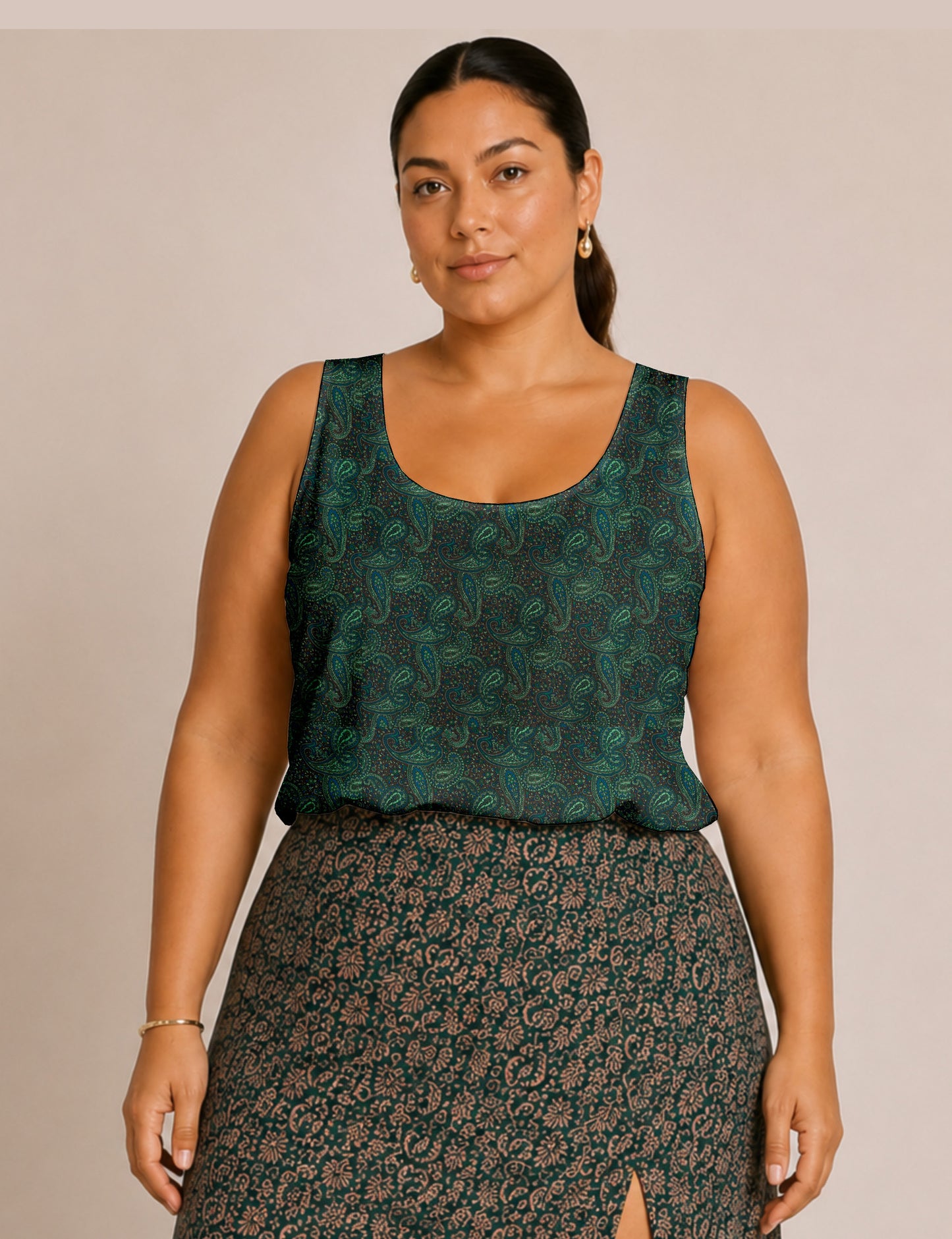 Women's sleeveless blouse with a relaxed straight fit, wide scoop neckline, deep scoop back, and hip-length silhouette.
