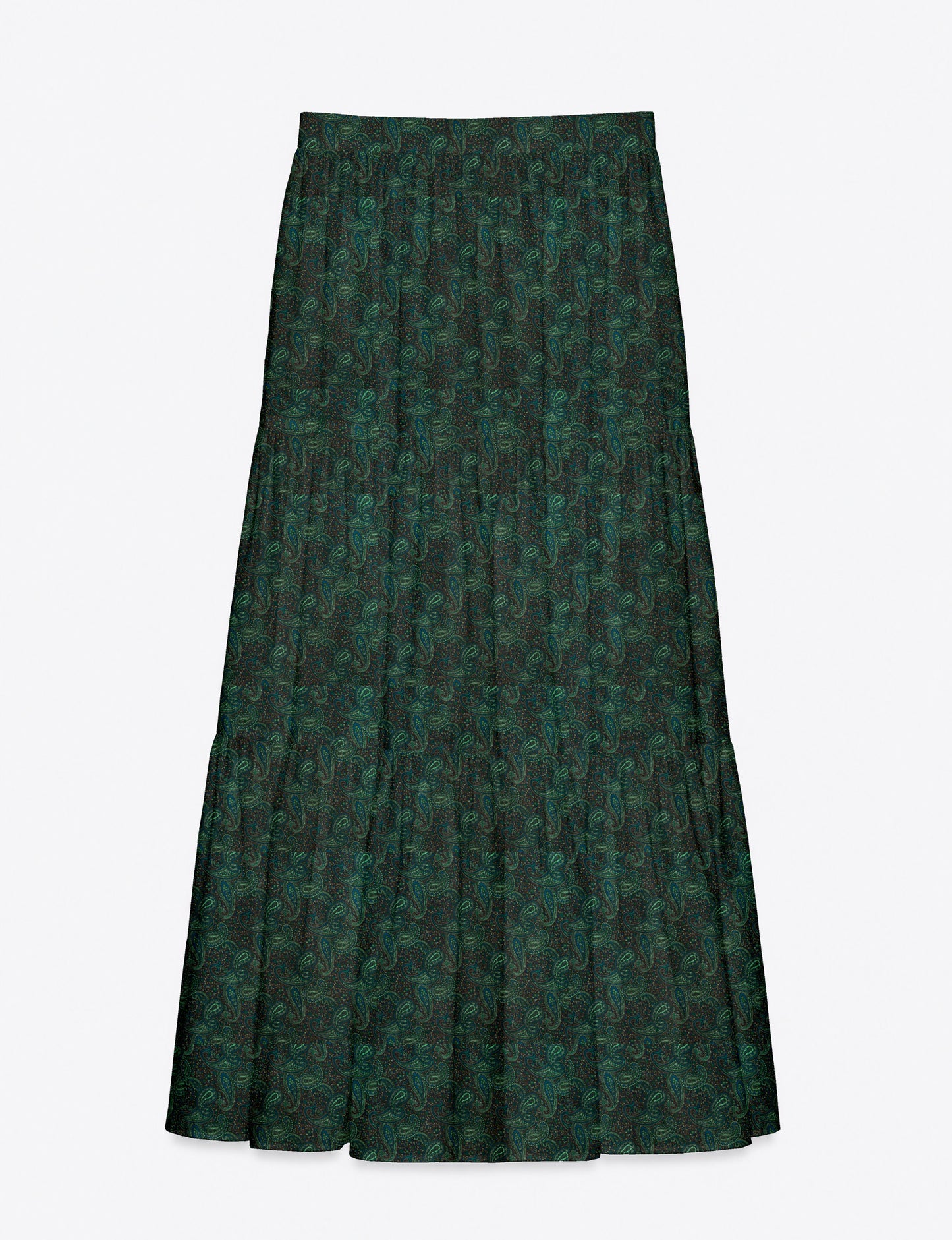 Woman wearing a yellow midi tiered skirt with a small geometric pattern, shown from the back, paired with beige top and