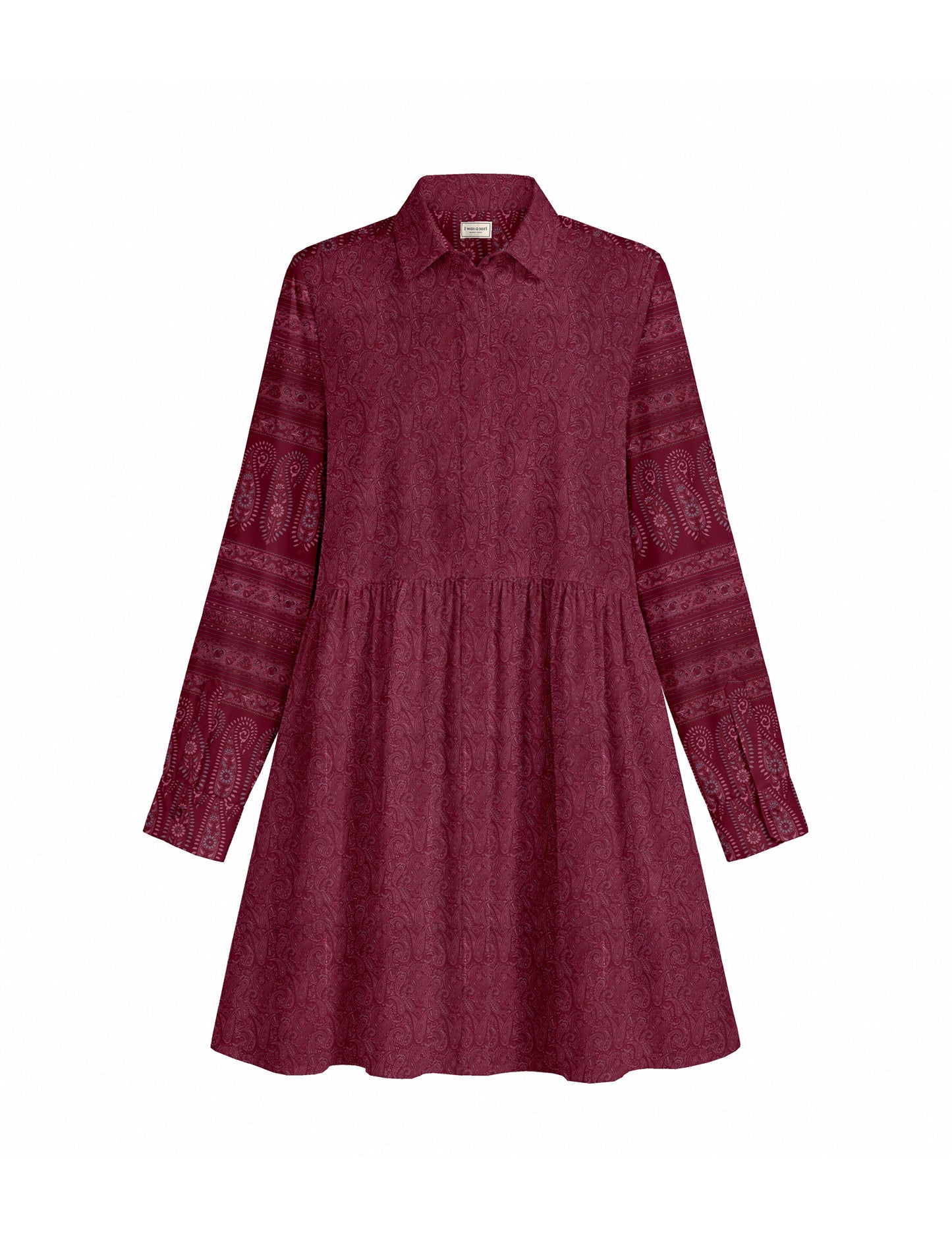 Short shirt dress with a relaxed A-line silhouette, point collar, partial button placket, gathered waist, side pockets, and full-length cuffed sleeves.
