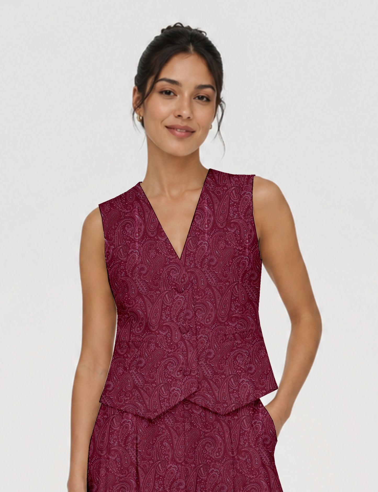 Women's fitted waistcoat with V-neck, single-breasted button closure, tailored silhouette, and pointed hem in sustainable fashion.