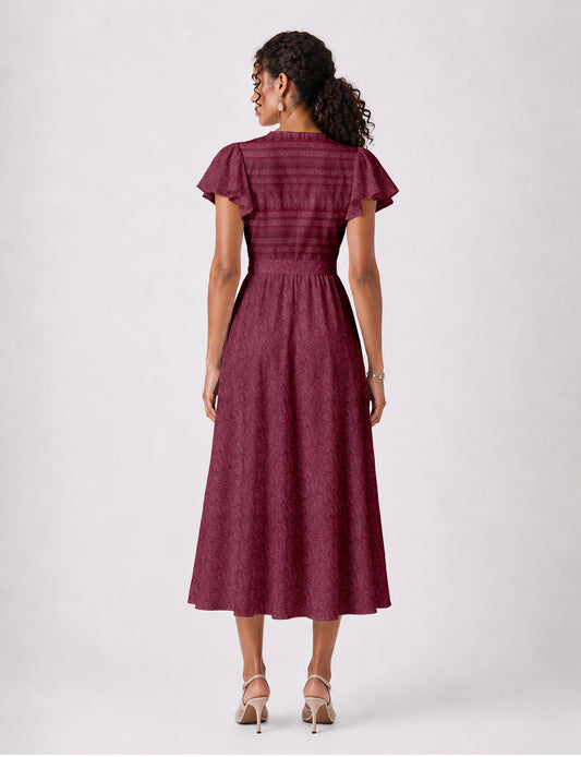 Elegant midi wrap dress with a V-neckline, adjustable waist tie, fitted bodice, and flared skirt for a timeless, flattering silhouette.